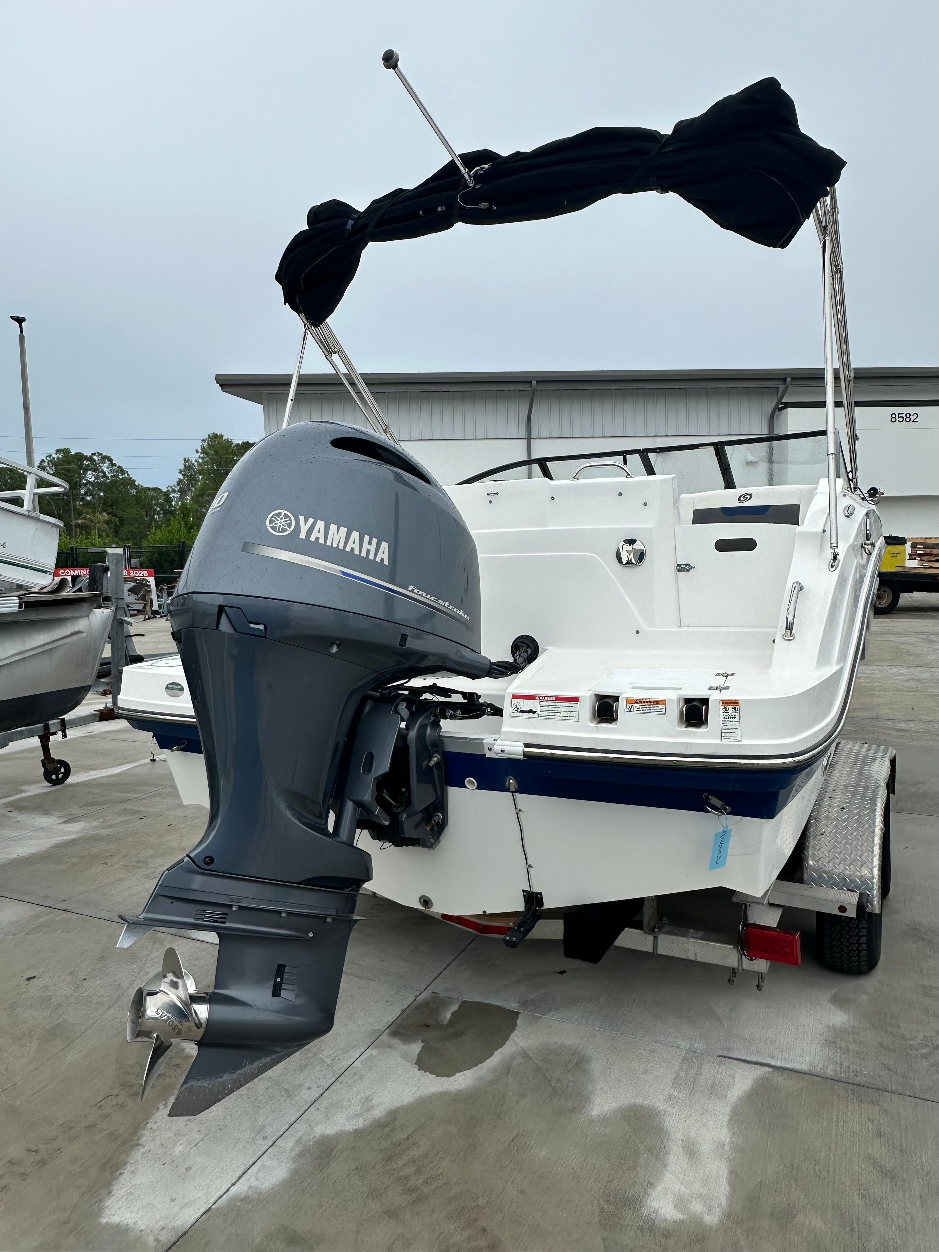 2022 Hurricane 235SD boat with Yamaha outboard motor.