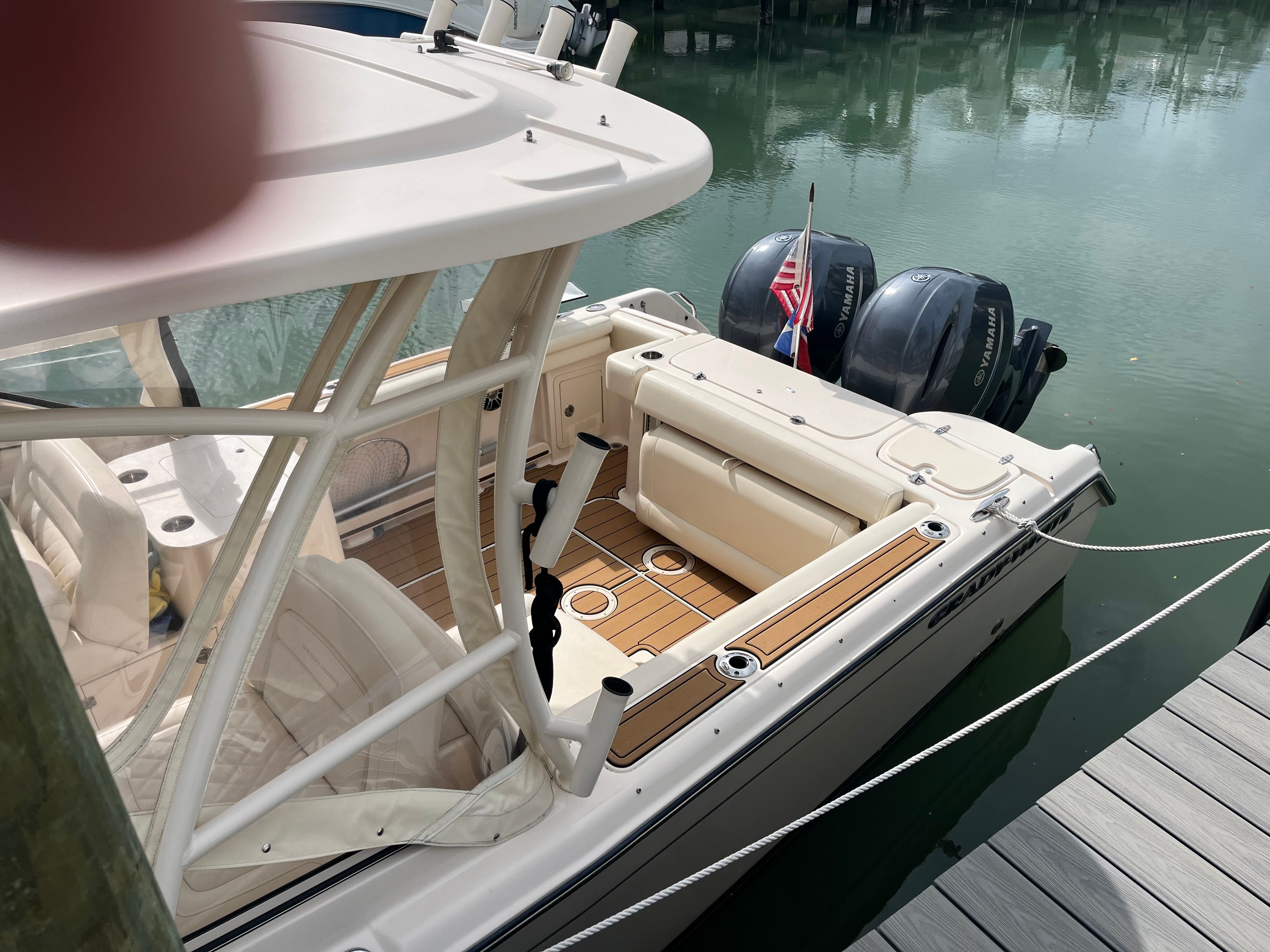 2022 Grady-White Freedom 275 boat docked with Yamaha engines.