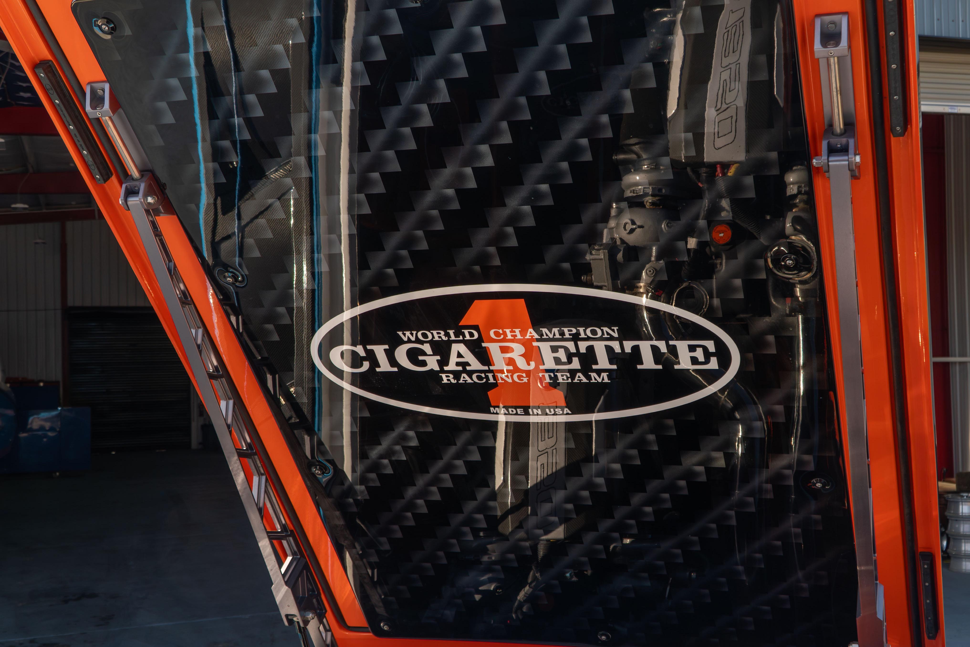2022 Cigarette 515 boat with World Champion Racing Team logo, carbon fiber detail.