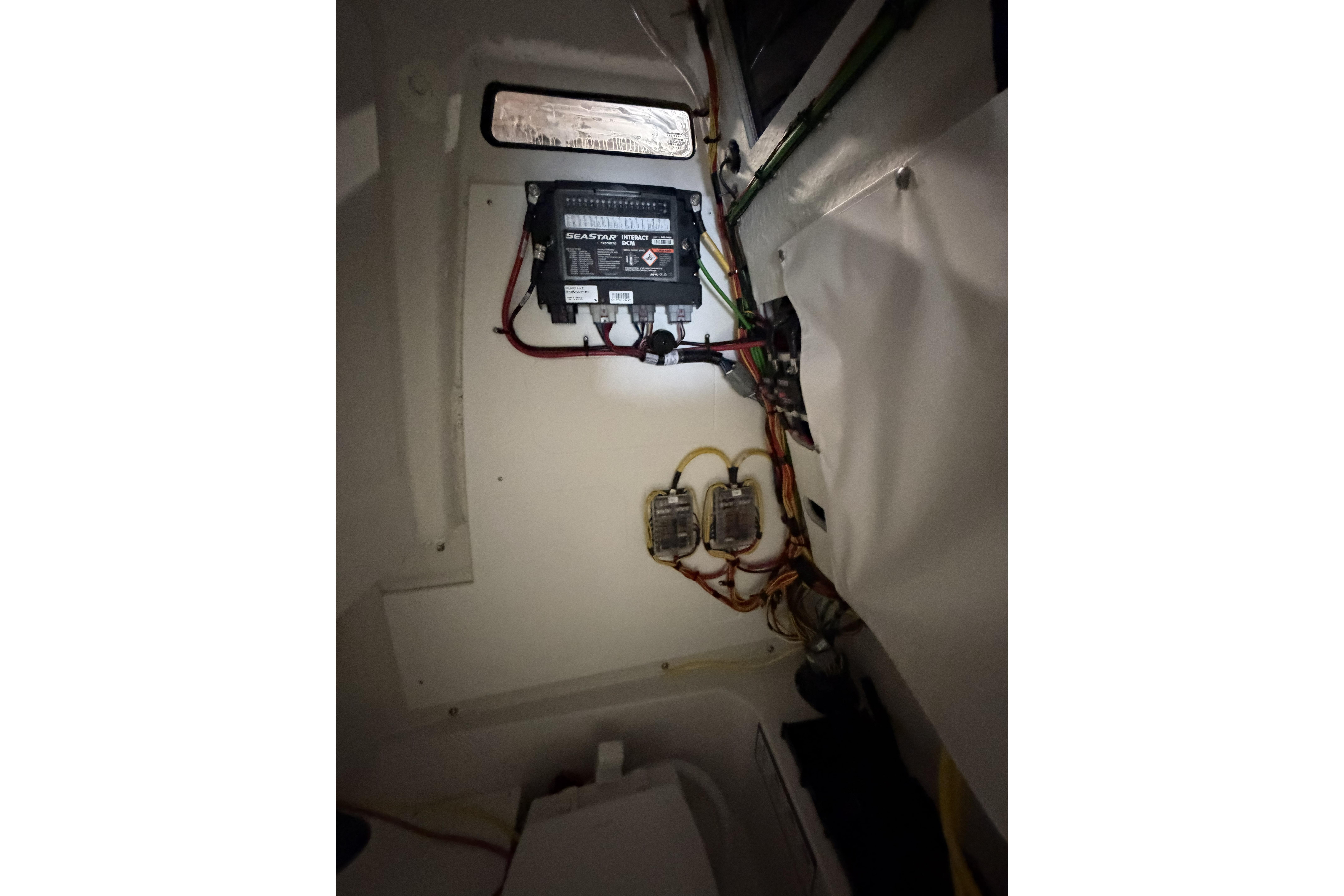 Electrical wiring and components inside a 2026 Sportsman Open 232 Center Console boat.