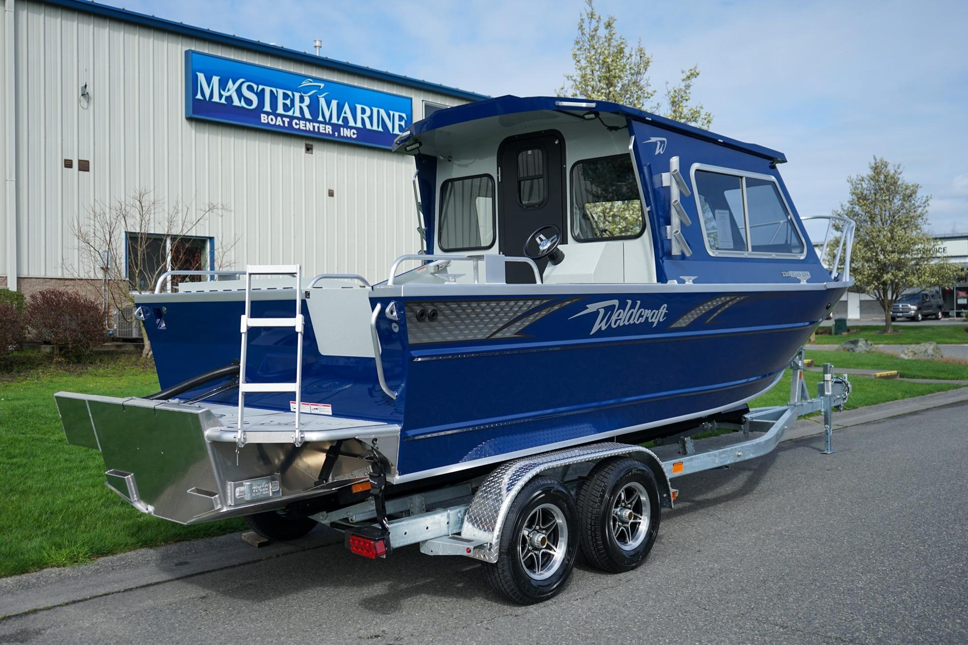 2026 Weldcraft 220 Ocean King boat on trailer at Master Marine Boat Center.