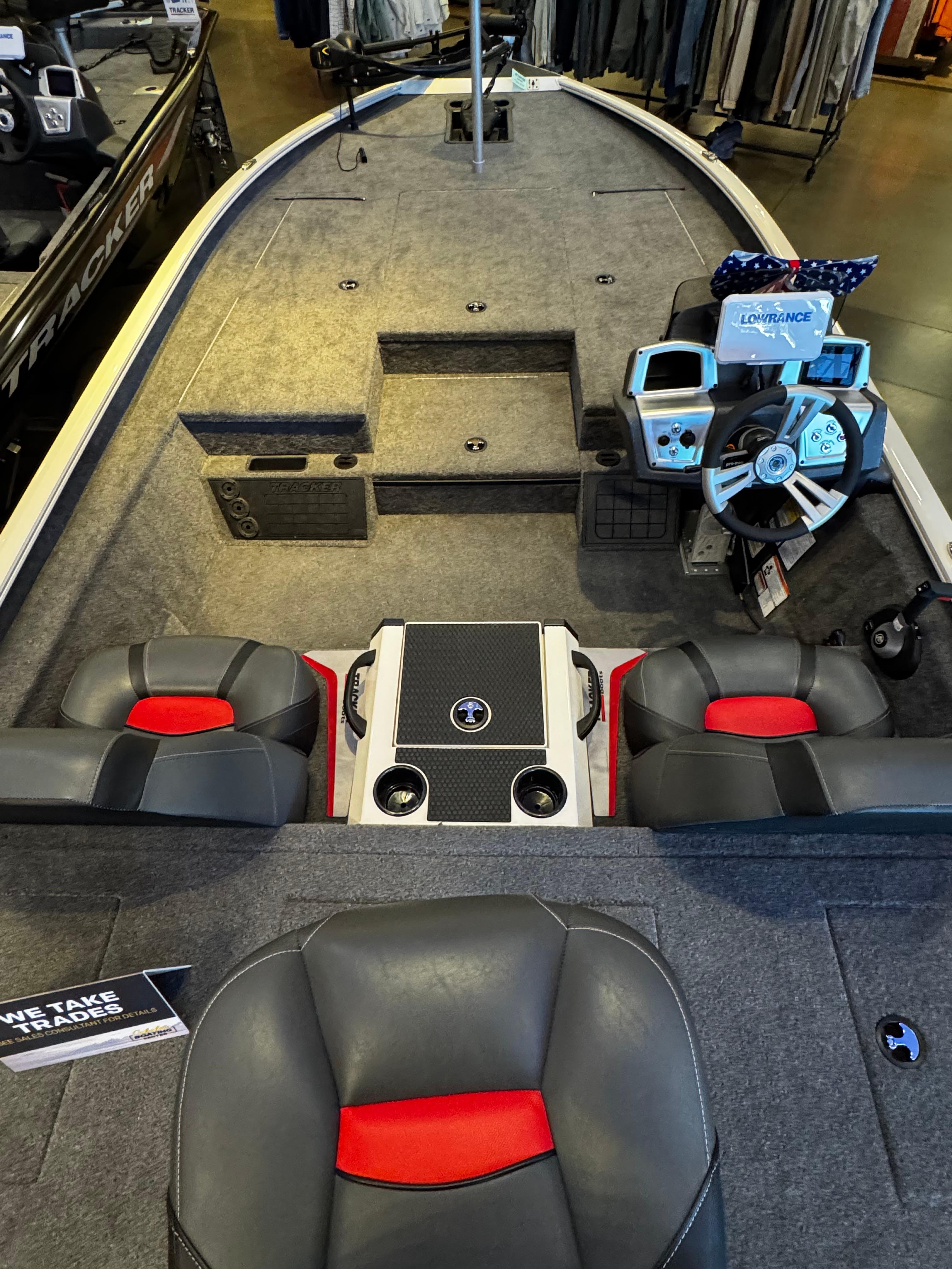 2025 Tracker Savage 215 boat interior with seating and control panel.
