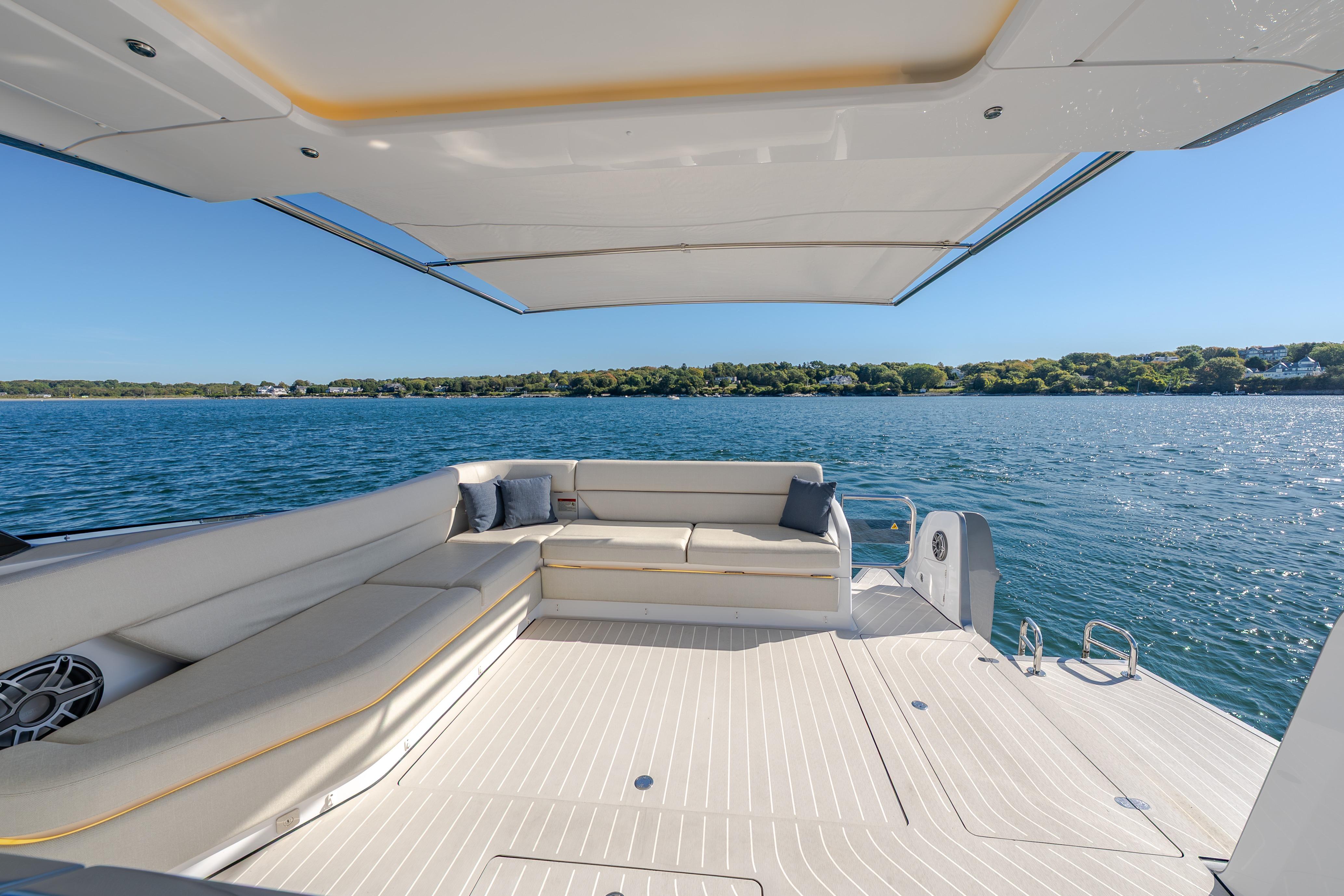 Luxurious 2023 Azimut Verve 47 yacht deck with scenic ocean view.