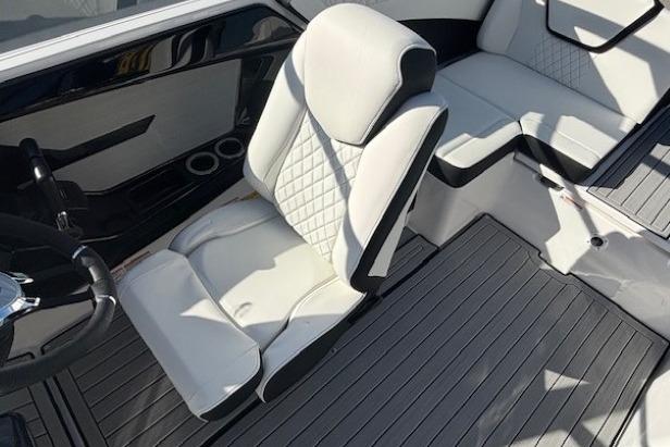 Luxurious interior of 2026 Yamaha Boats 222S with white seating and sleek design.