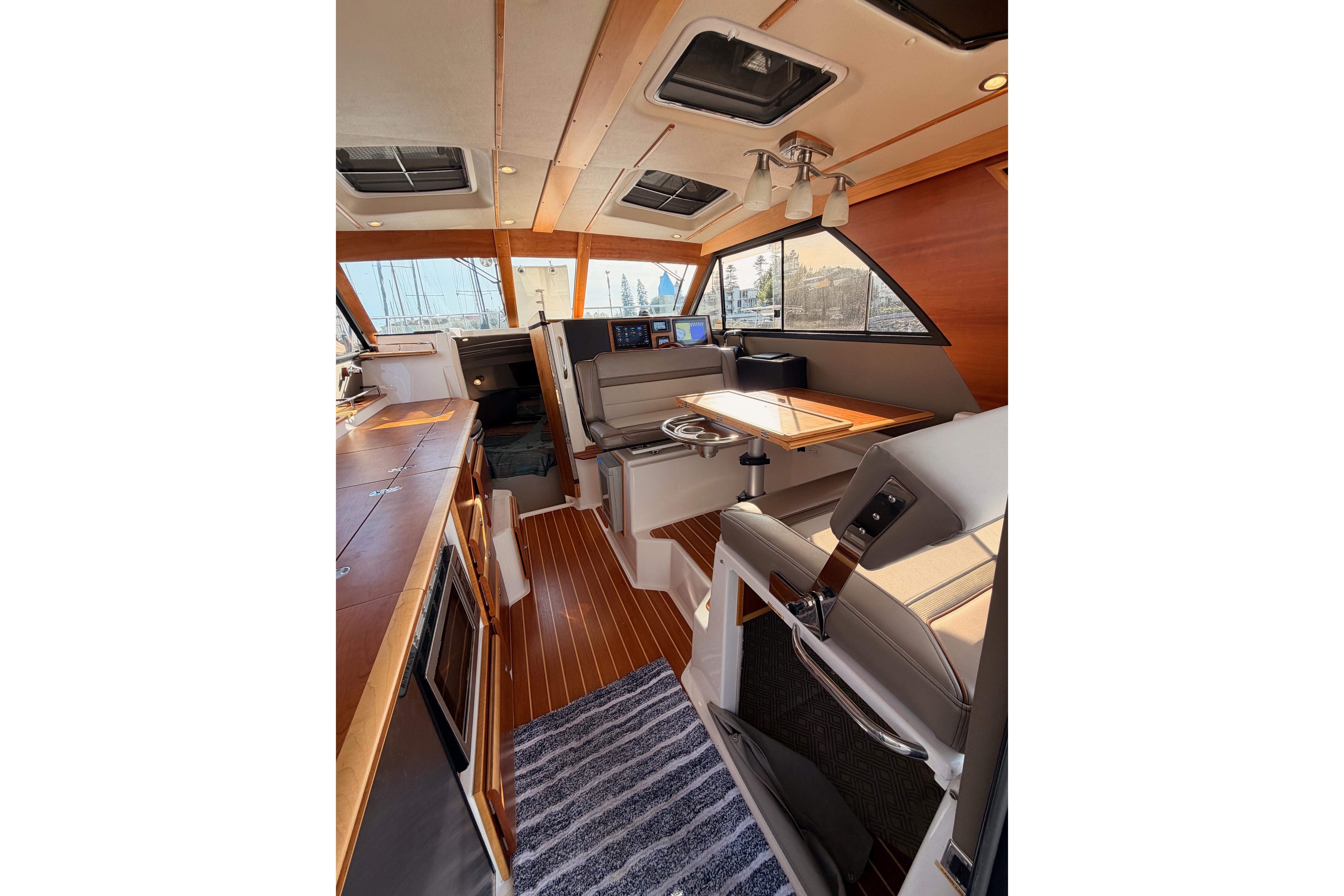 Interior of 2021 Cutwater C-32 CB boat, featuring modern design and luxurious seating.