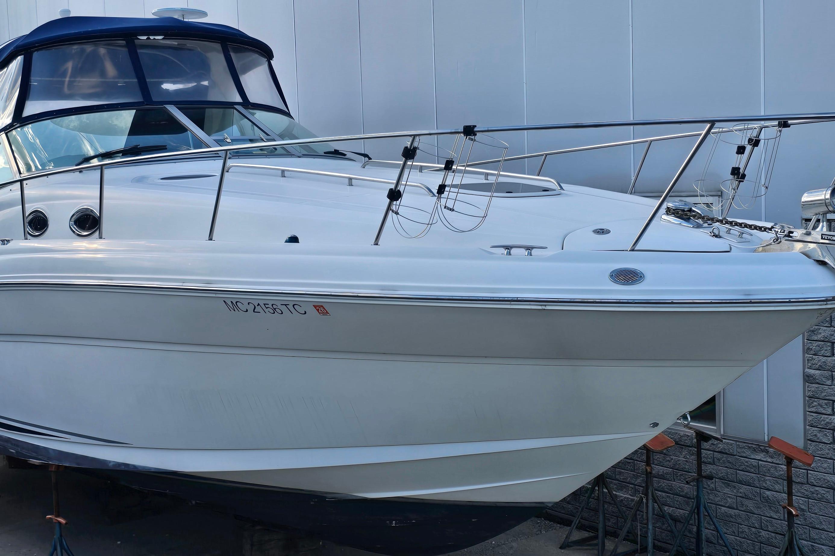 2007 Sea Ray 340 Sundancer boat docked, featuring sleek design and modern amenities.