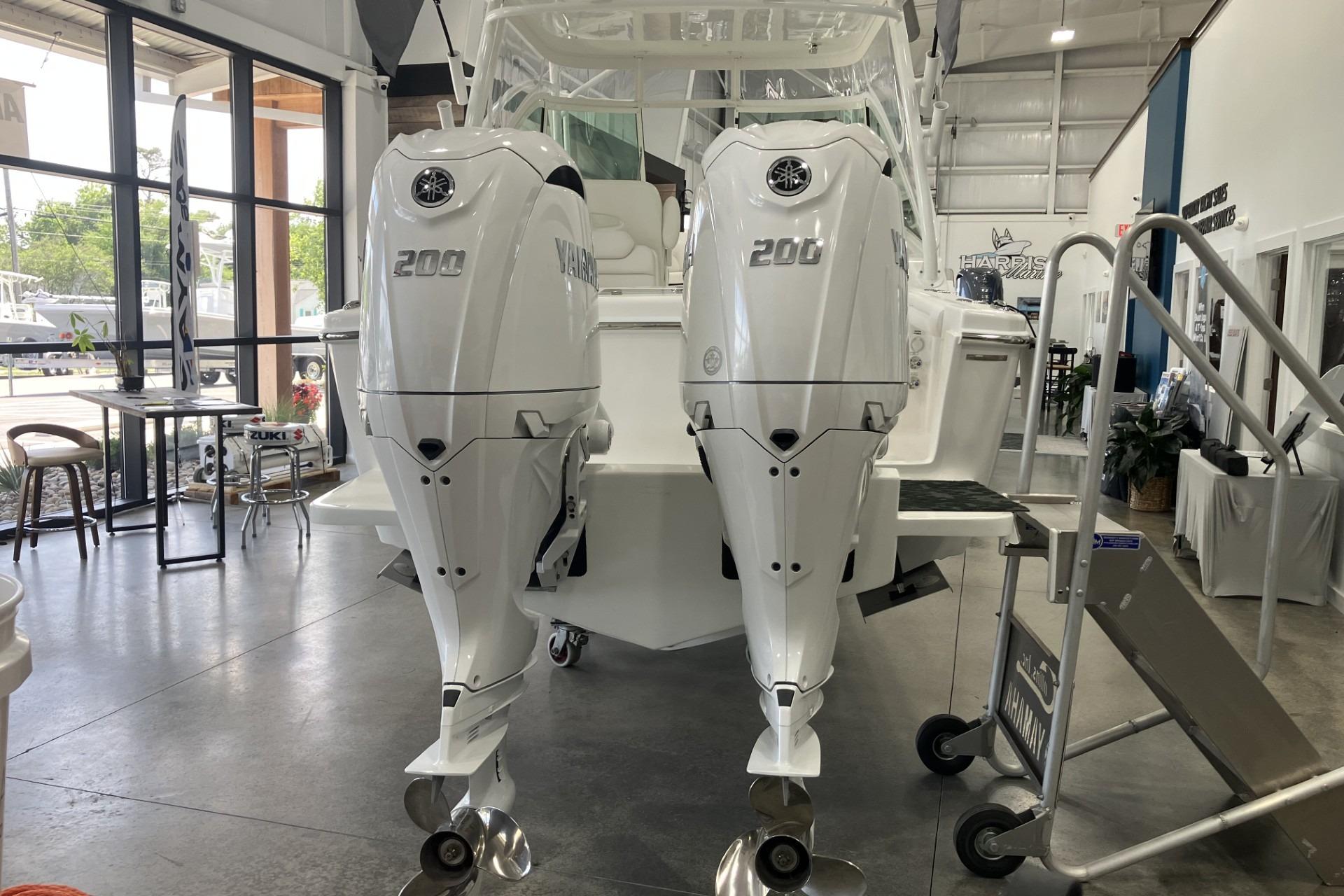 2026 Albemarle 27 Dual Console with twin Yamaha 200 engines in showroom.