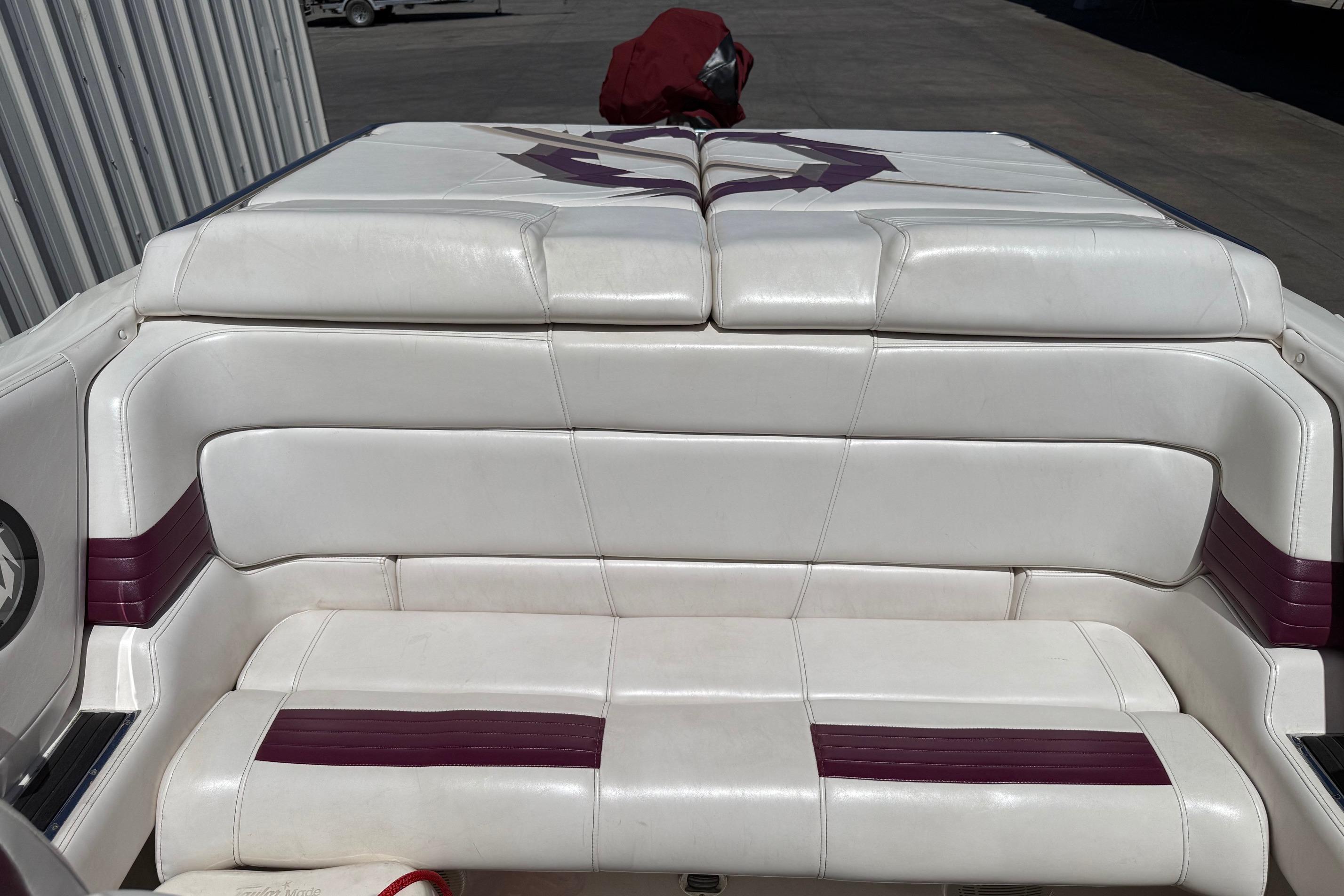 White and maroon seating on a 1998 Fountain 35 Lightning boat.
