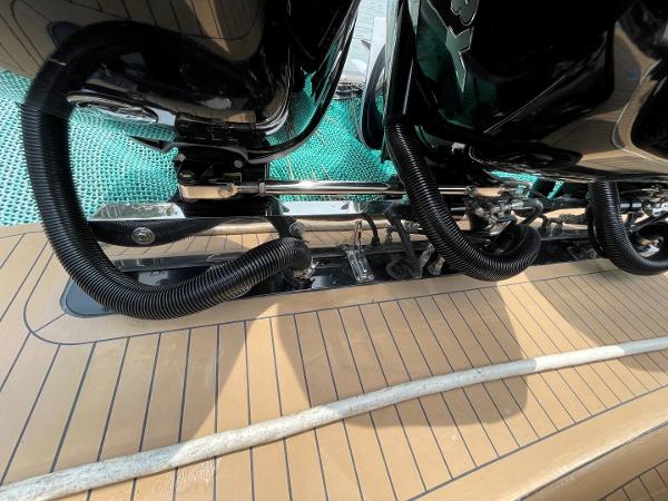 2020 Scout 420 LXF boat deck with engine components and teak flooring.