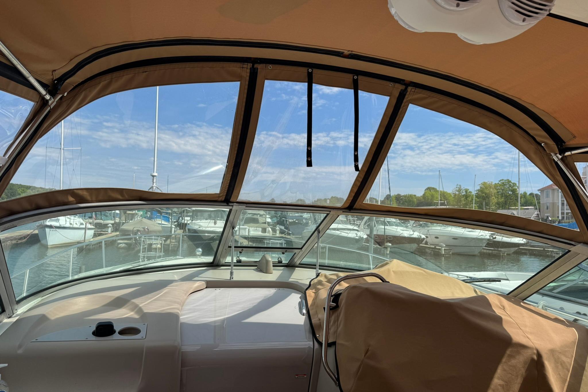 Interior view of 2001 Sea Ray 340 Sundancer yacht docked at marina.