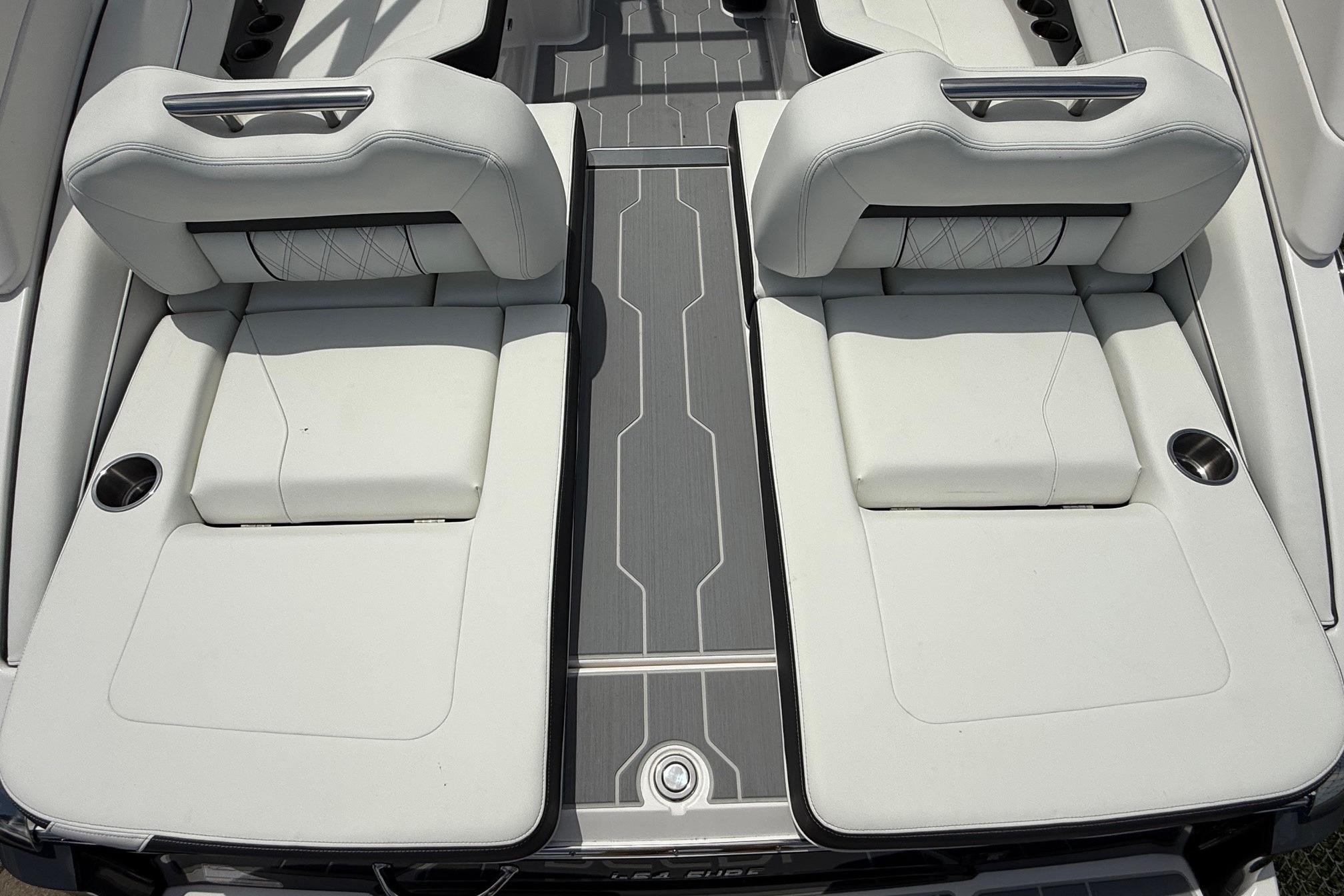 2026 Regal LS4 Surf boat interior with luxurious white seating and sleek design.