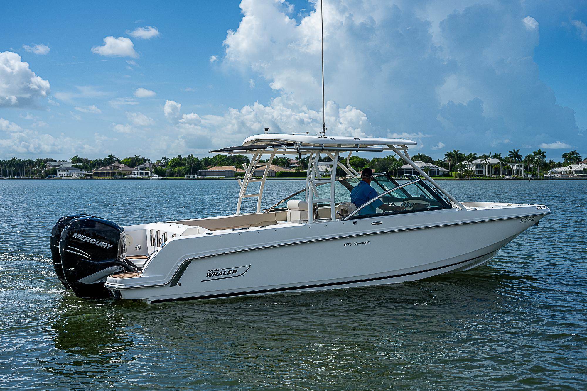 2018 Boston Whaler 270 Vantage boat cruising on a sunny day.