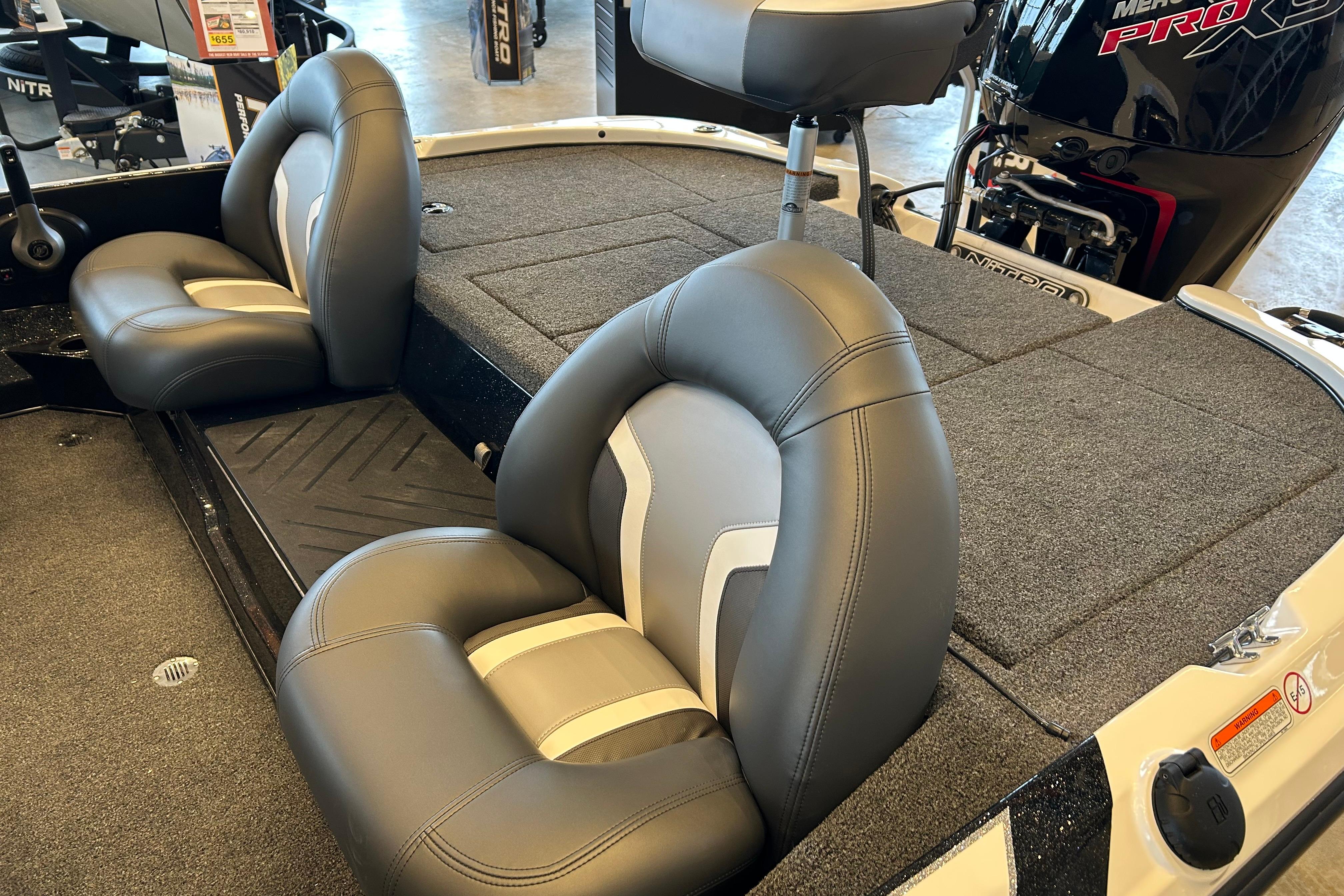 2026 Nitro Z17 boat interior with cushioned seats and carpeted deck.
