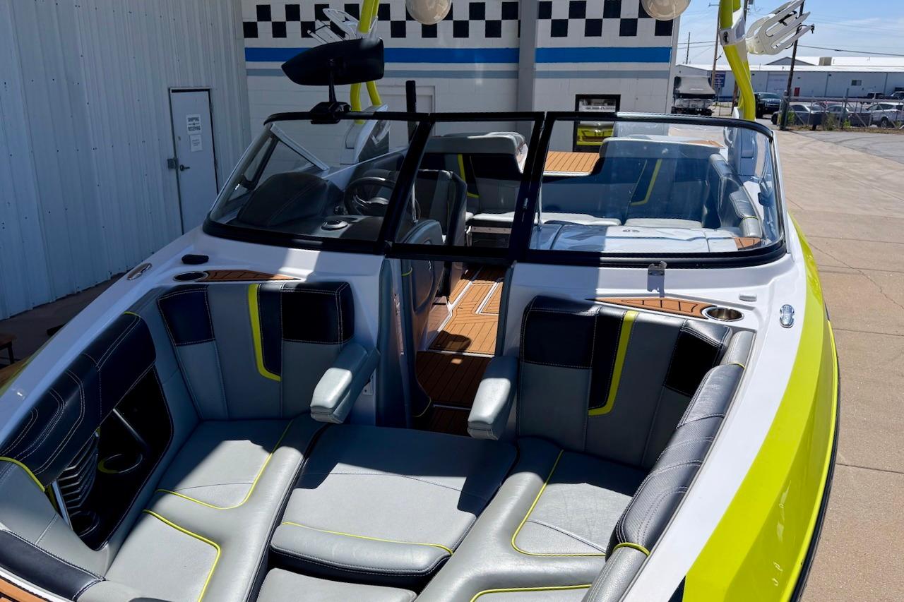 2014 Nautique Super Air Nautique G21 boat with sleek interior and vibrant accents.