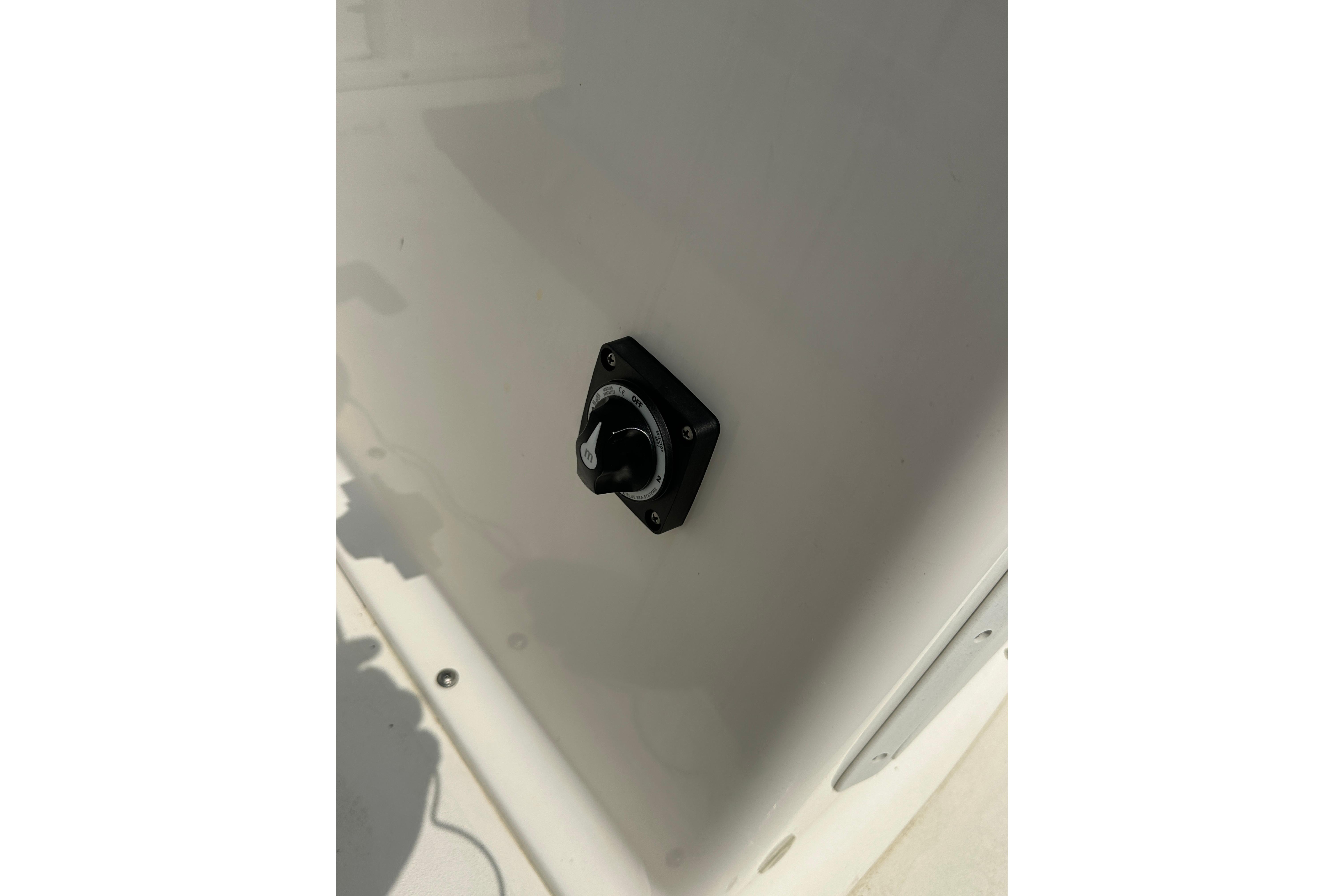 2018 Key West 1720 Center Console boat switch on white panel.