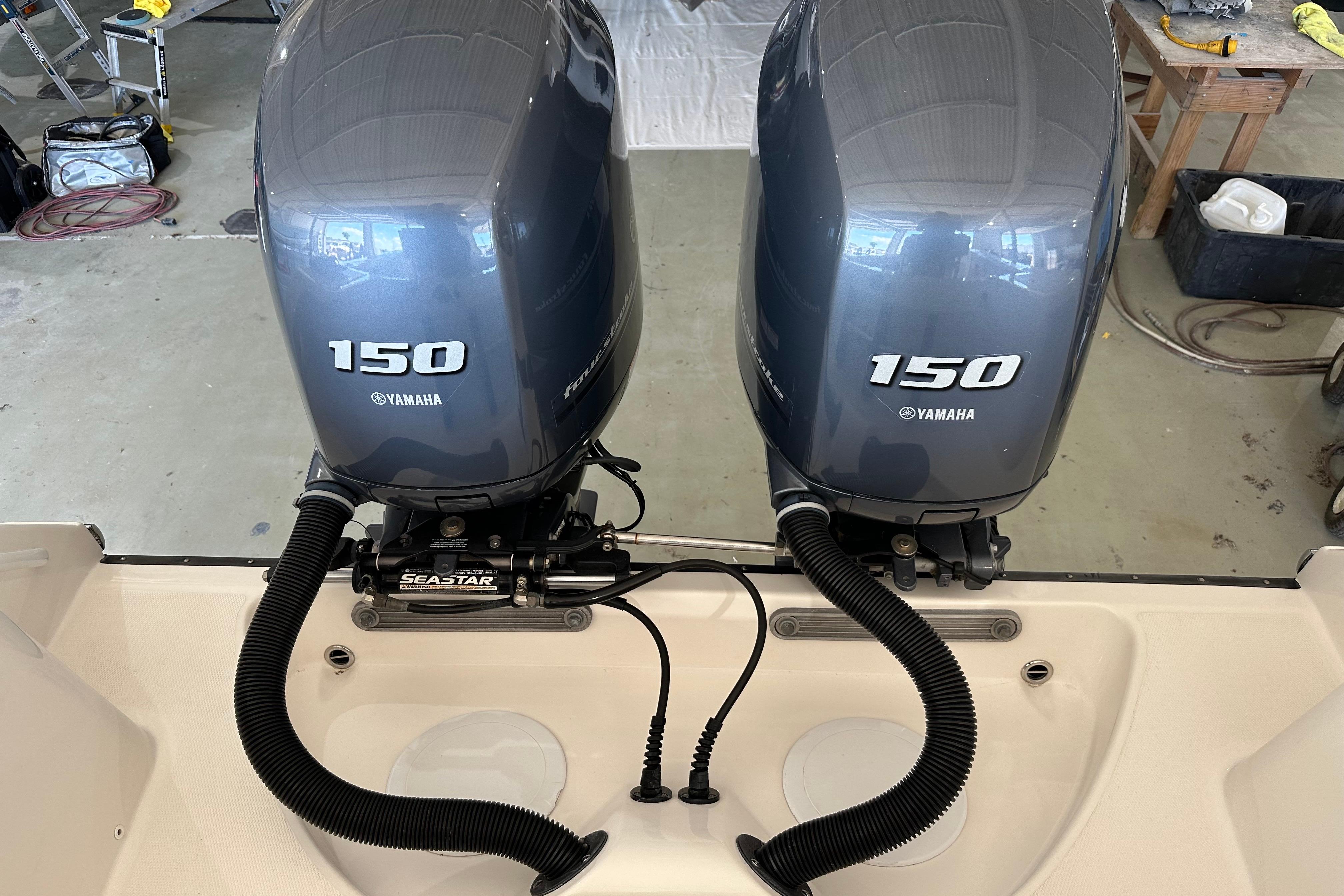 Twin Yamaha 150 outboard engines on a 2015 Edgewater 245CC boat.