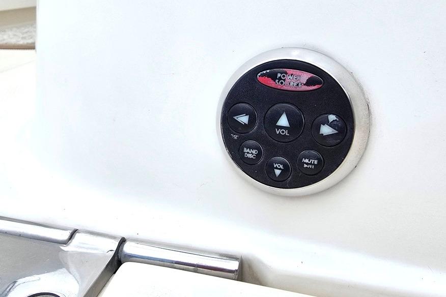 Audio control panel on a 2006 Sea Ray 240 Sundancer boat.