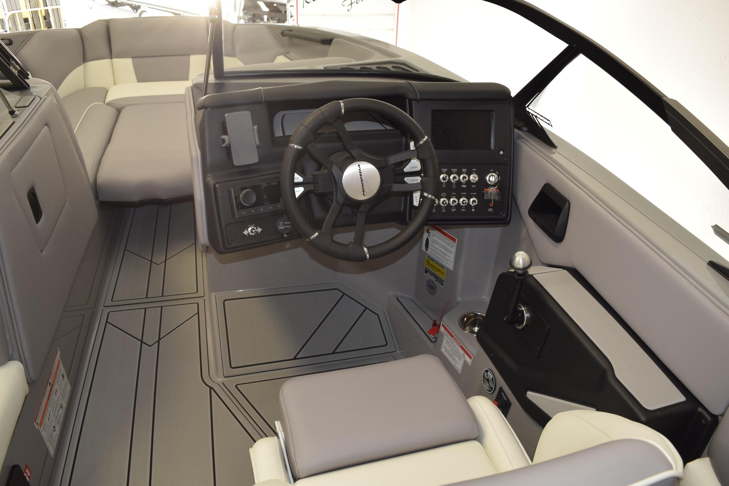 2026 Moomba Craz boat interior with modern dashboard and steering wheel.