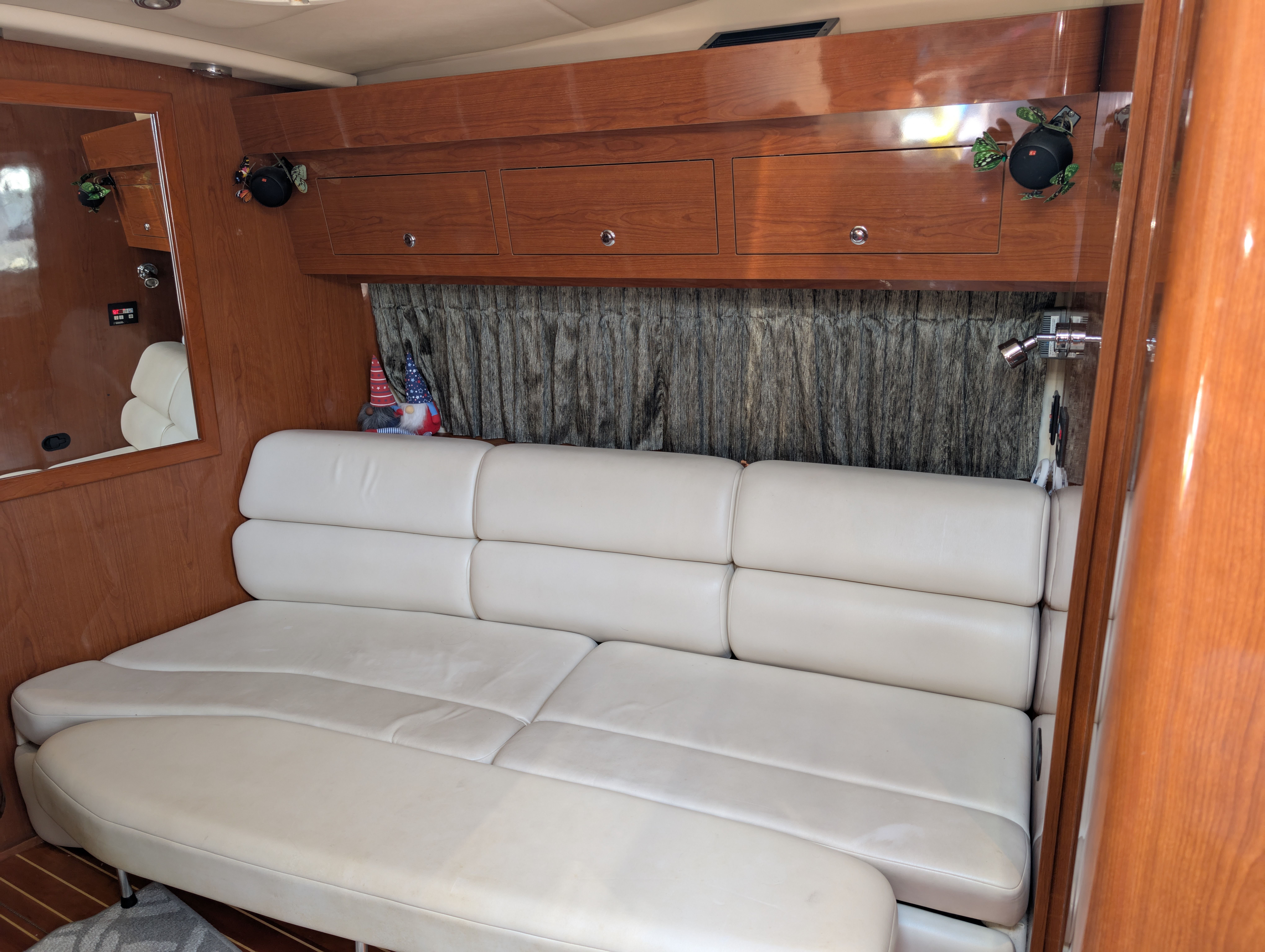 Interior of a 2005 Regal Commodore 3560 yacht with leather sofa.