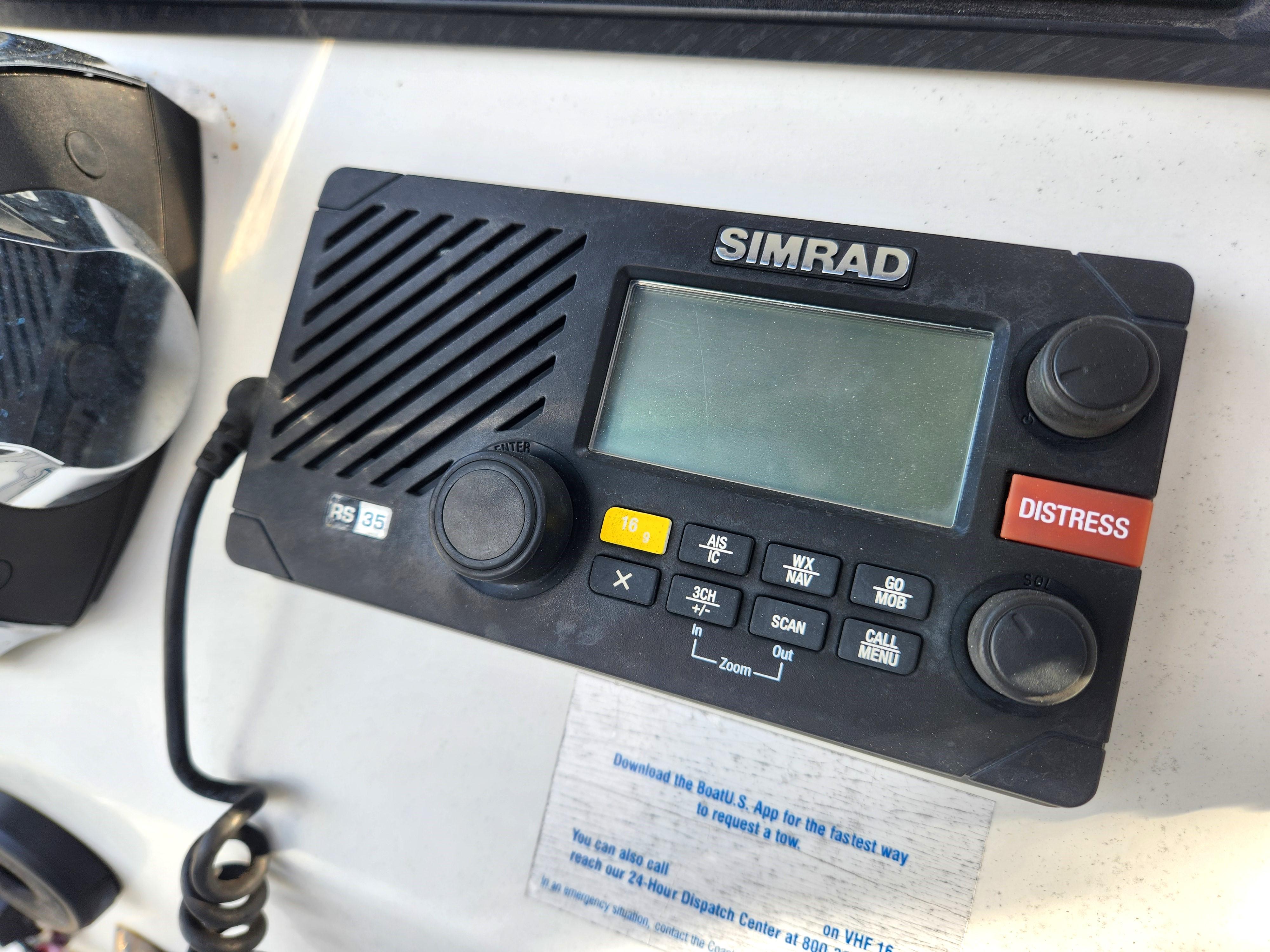 Simrad marine radio on 2006 Blue Fin Pro Fish C/C boat dashboard.