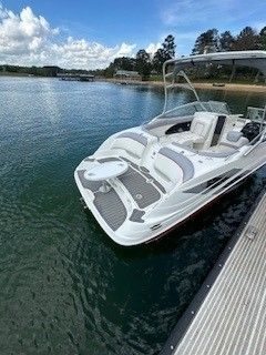 2008 Yamaha AR230 boat docked on calm water.