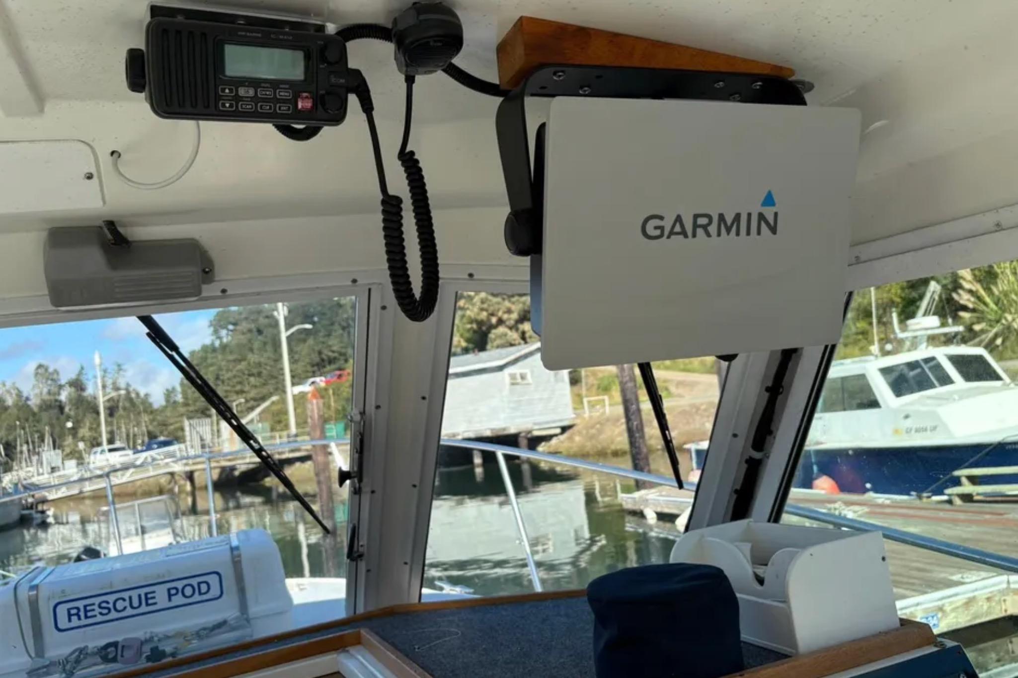 Interior of a 2005 Albin 28 Tournament Express with Garmin navigation system.