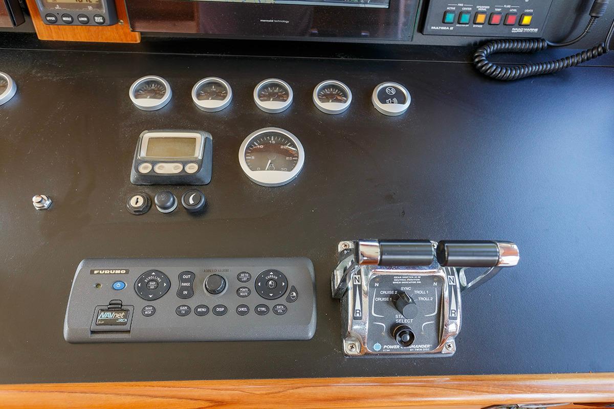 Control panel of 2009 Altena 53 Custom Trawler with gauges and navigation controls.