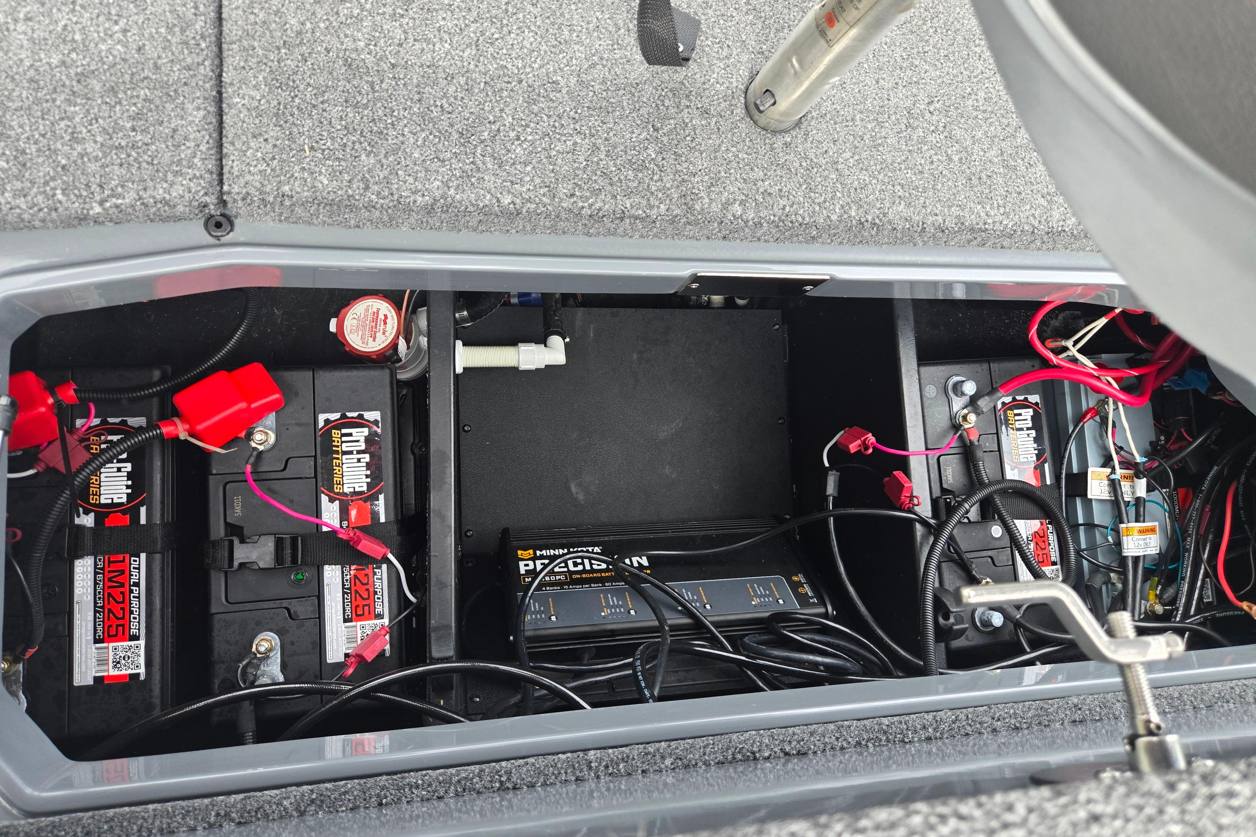 2022 Vexus VX20 battery compartment with ProGuide batteries and wiring setup.