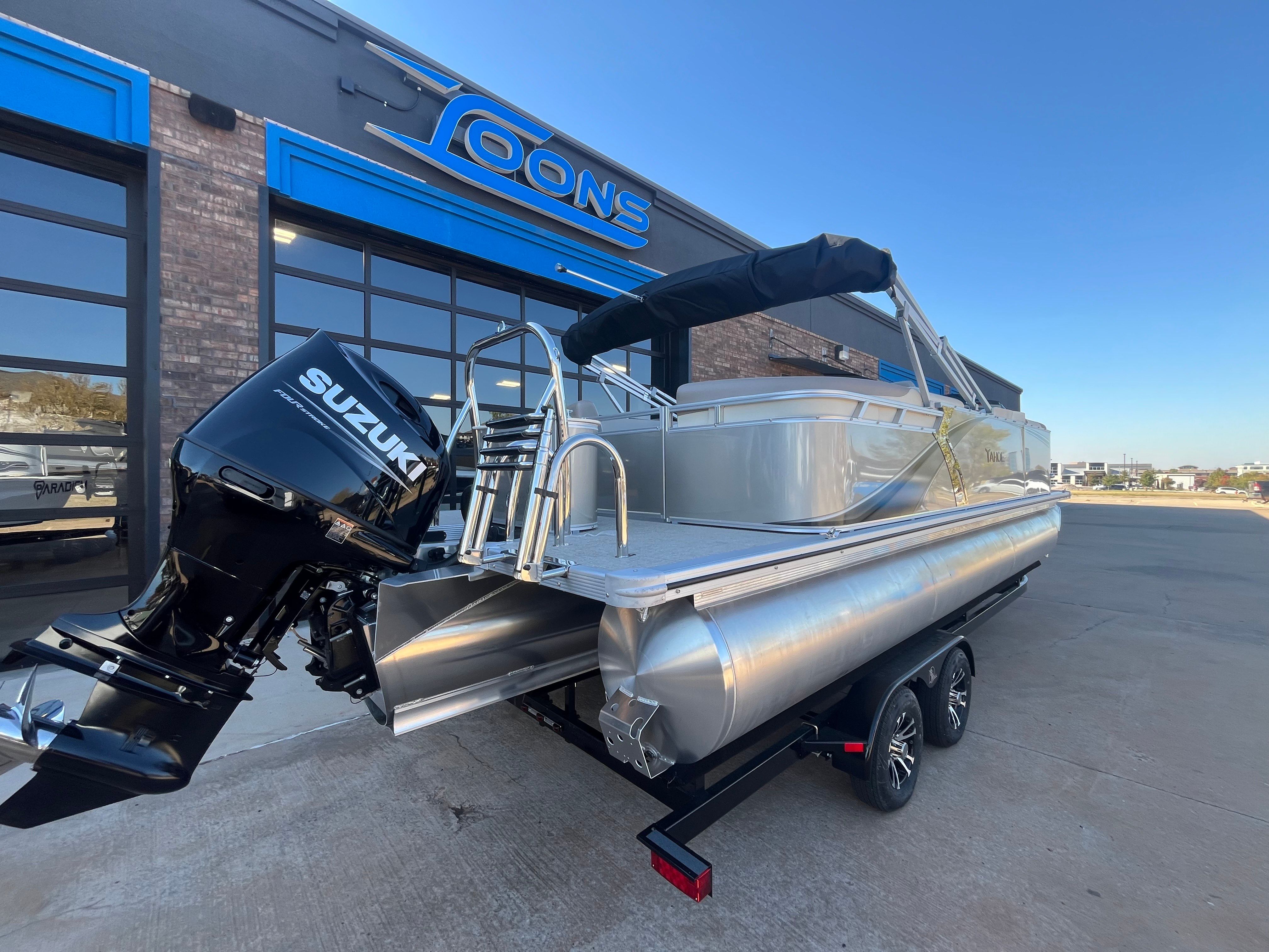 2026 Tahoe 2385 LTZ Quad Lounger pontoon boat with Suzuki engine.