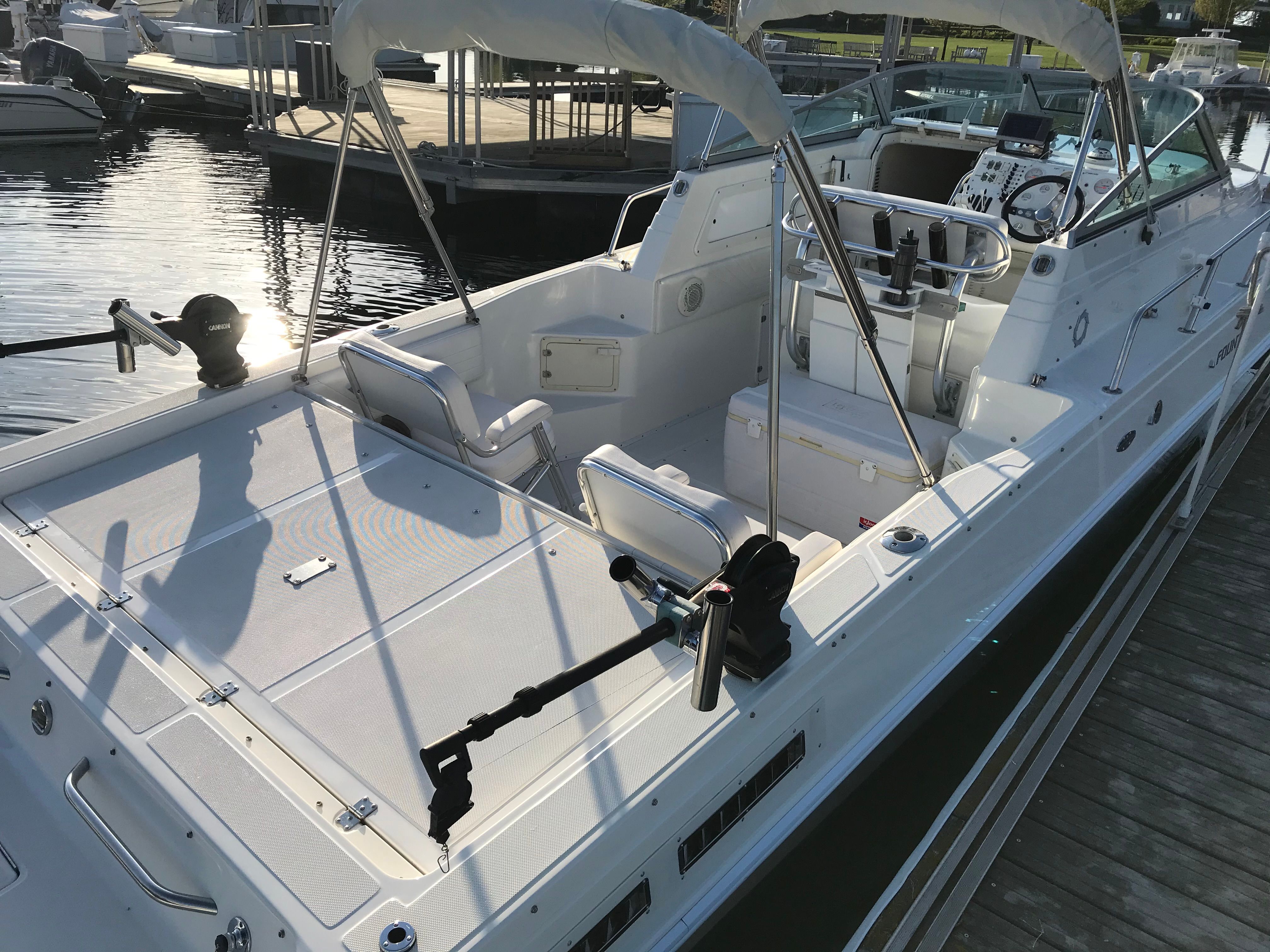 1999 Fountain 32 Sport Fish Cruiser at dock, interior view.