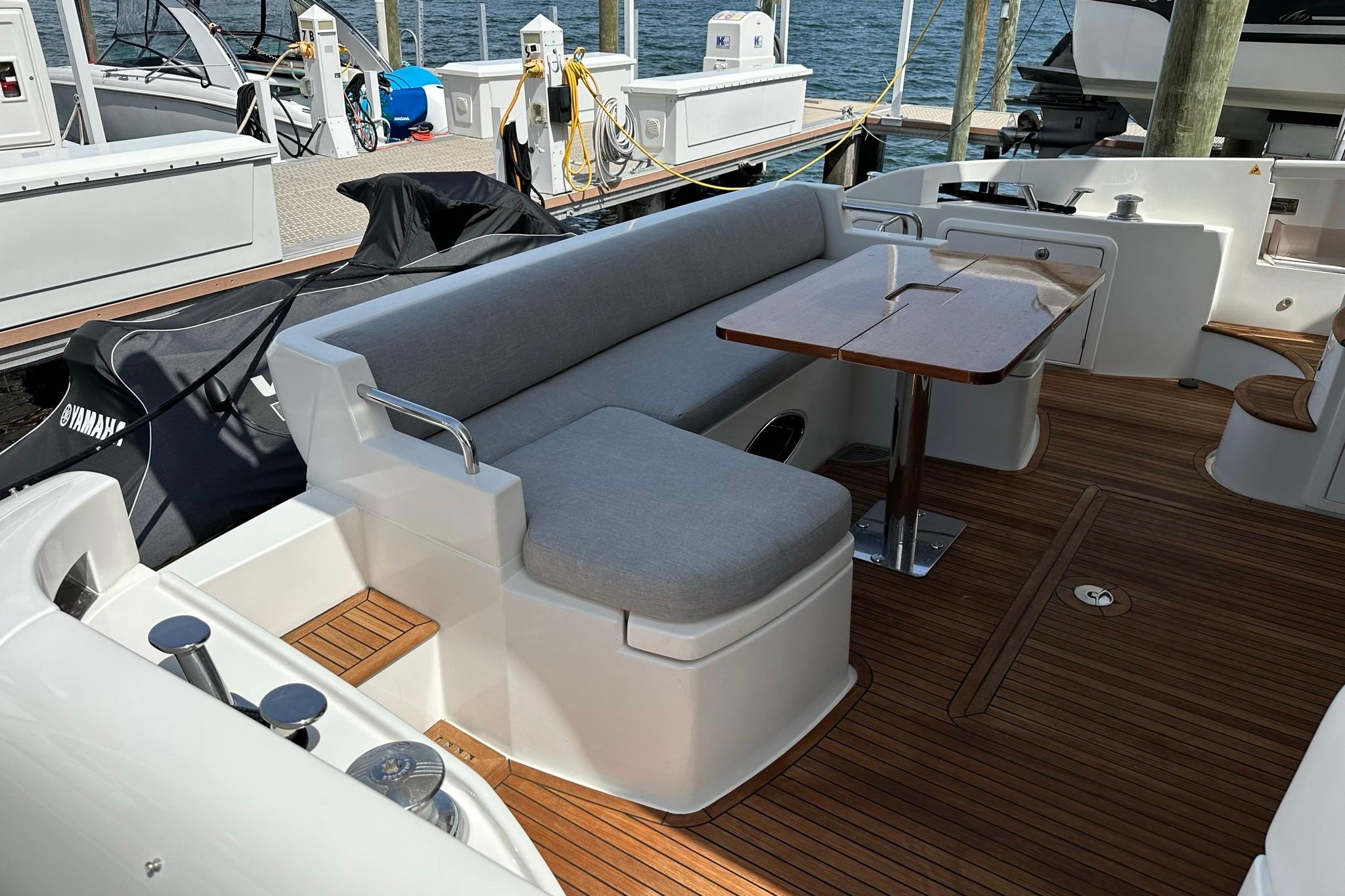 Azimut Fly 53 yacht 2013, featuring elegant deck seating and wooden flooring.