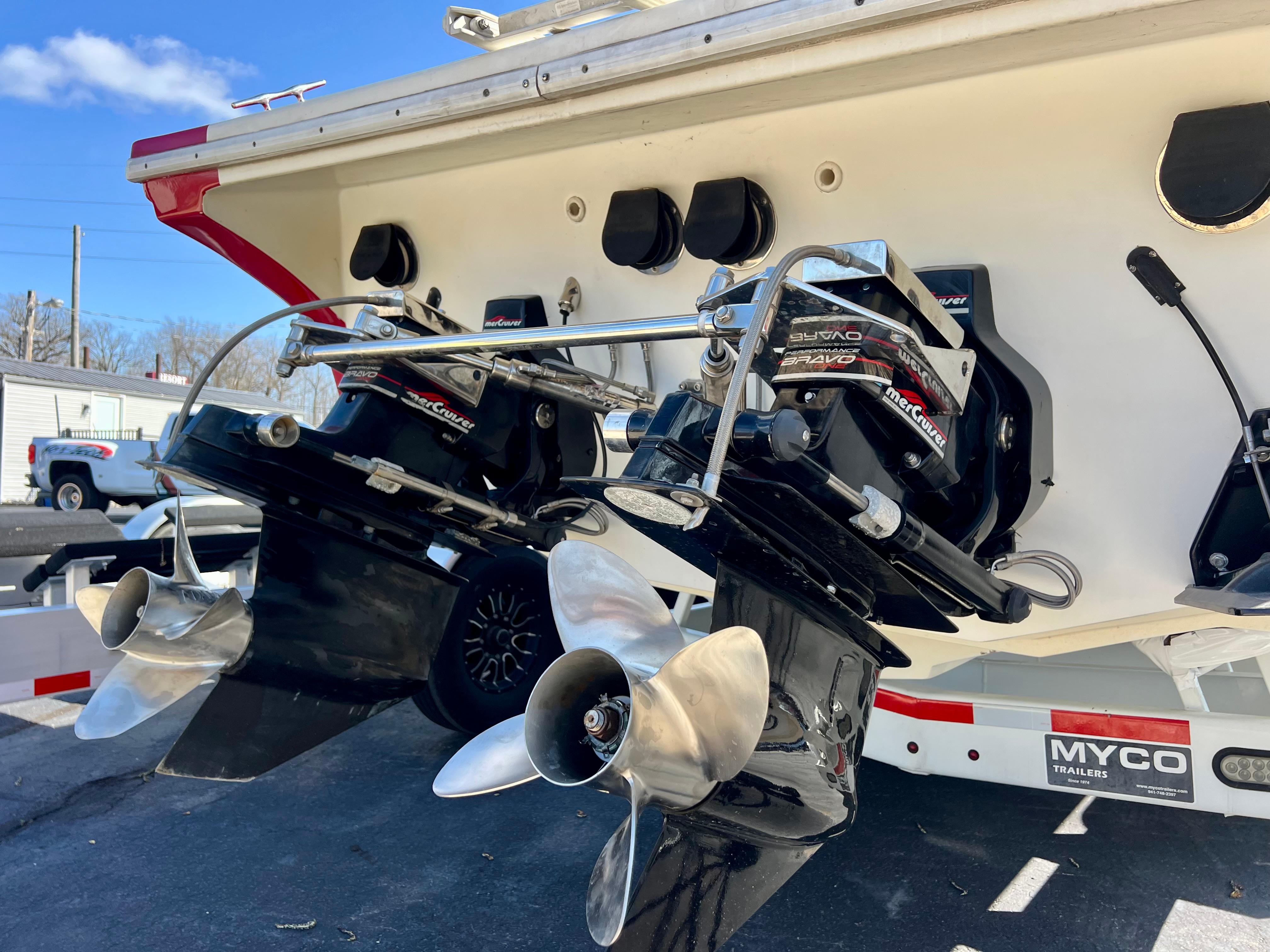 1999 Black Thunder 430 Flat Deck boat with dual propellers and Myco trailer.