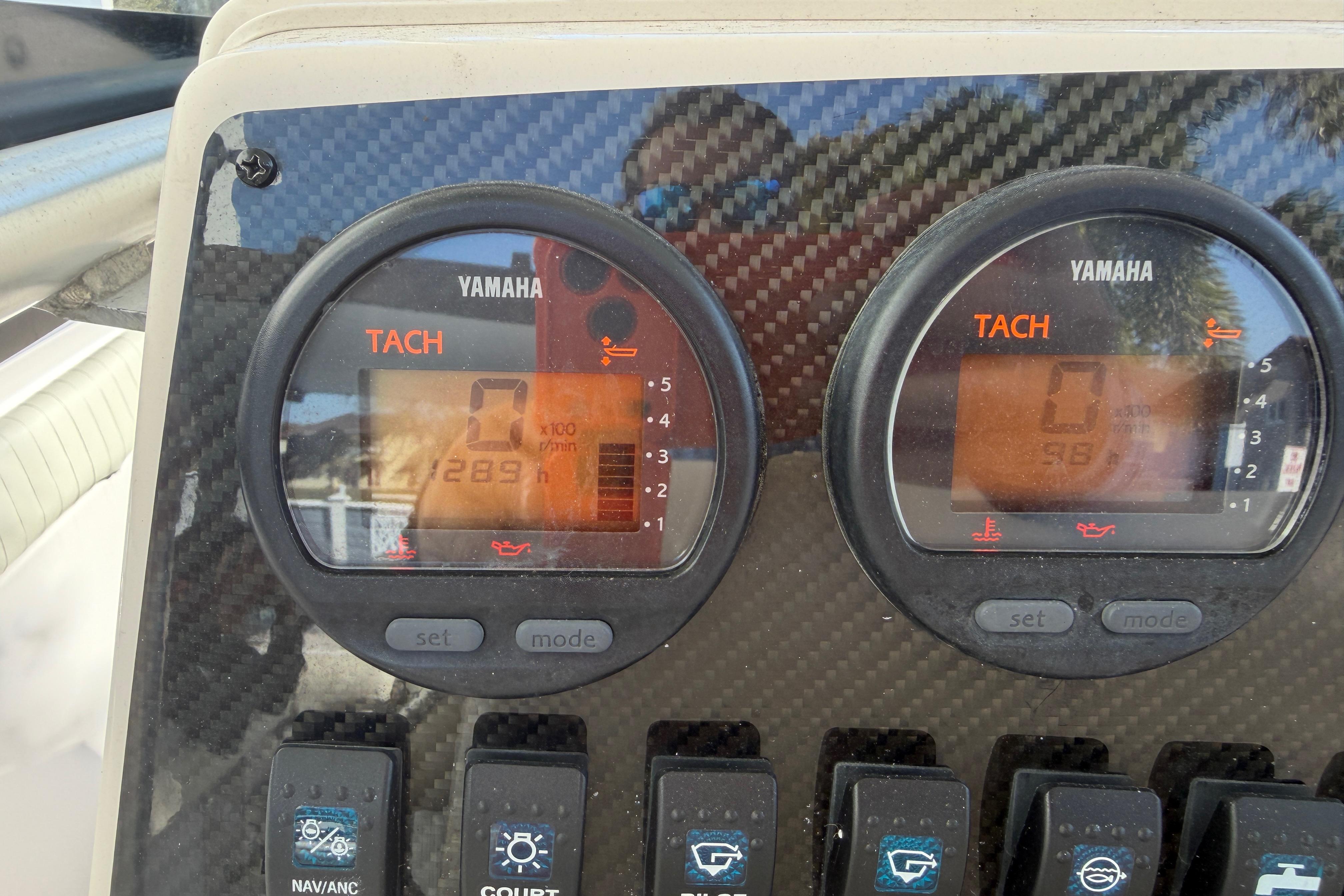 Yamaha tachometer display on 2004 Grady White 273 boat dashboard.