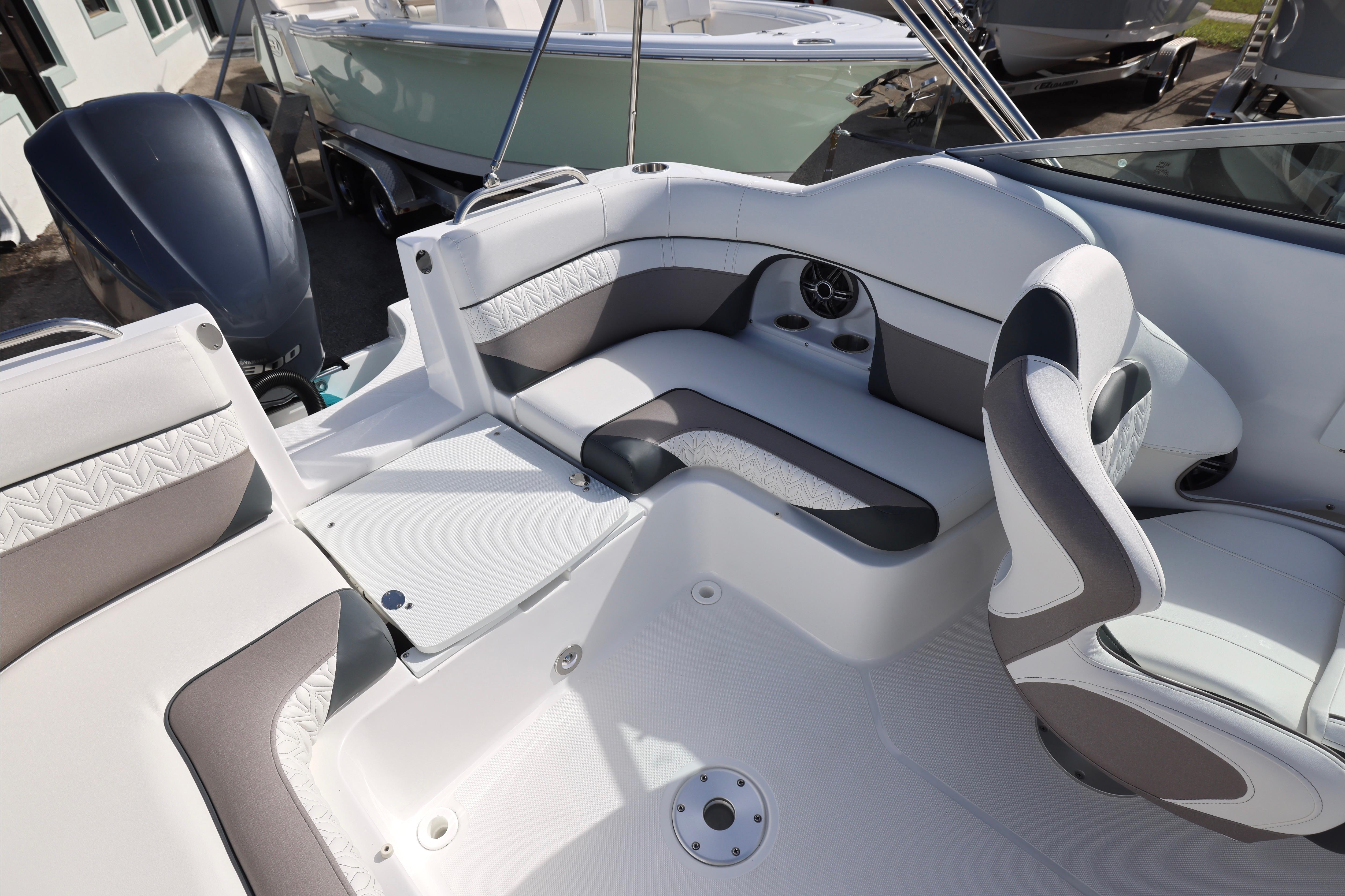 2026 Hurricane SunDeck 2486 OB boat interior with stylish seating and modern design.