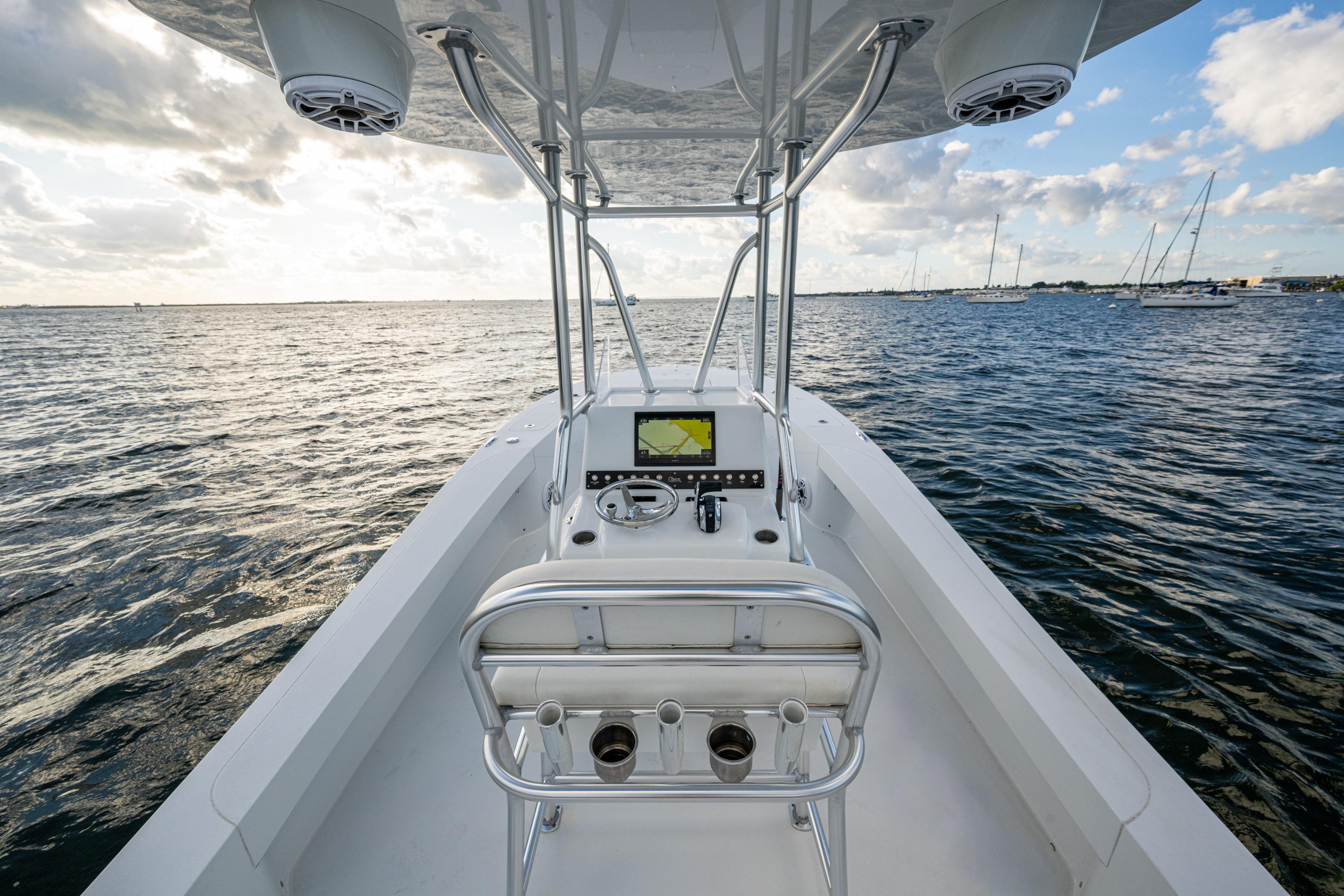 2022 Conch 25 boat on open water, featuring modern navigation equipment.
