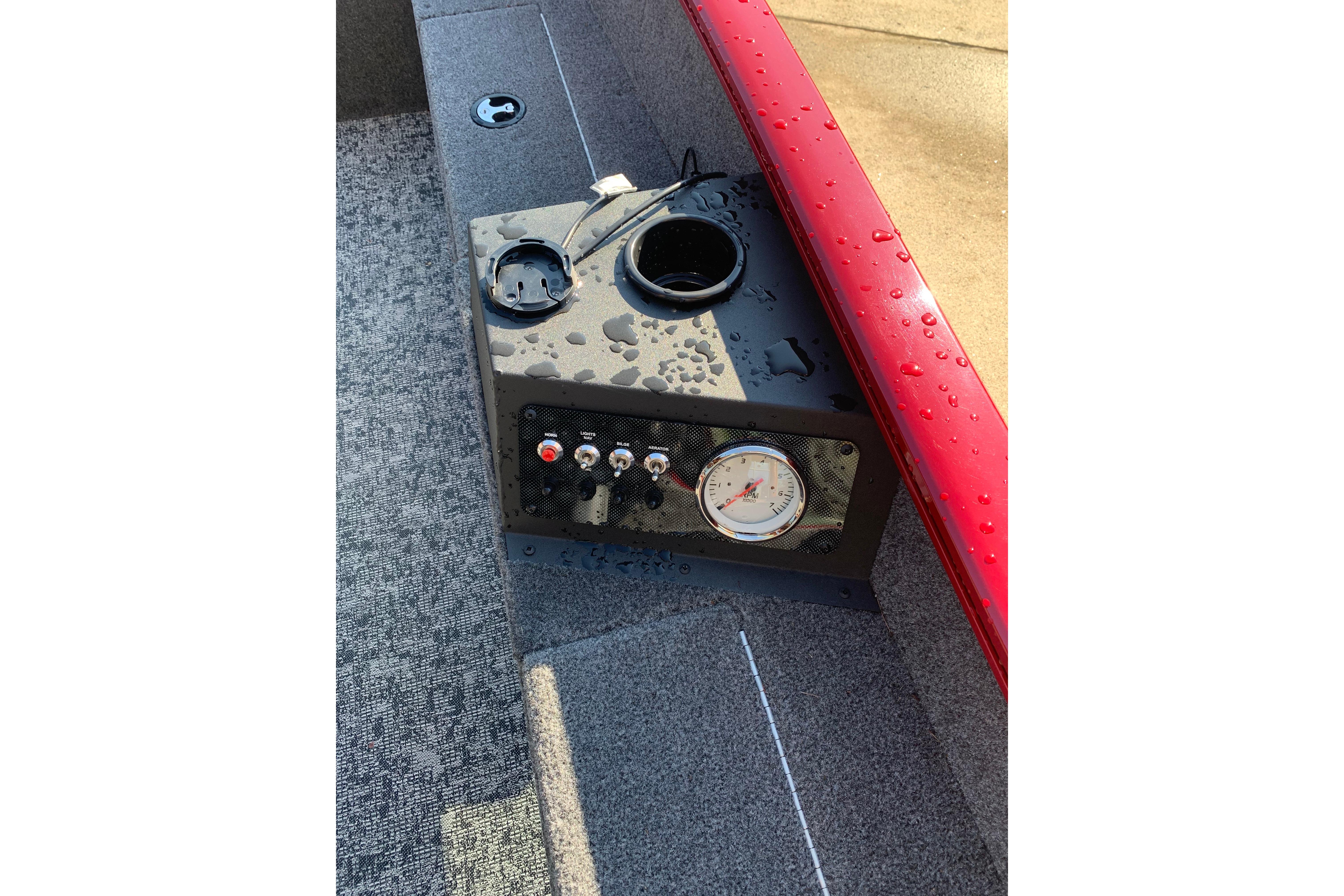 Control panel of 2025 Tracker Super Guide V-16 T boat with gauge and switches.