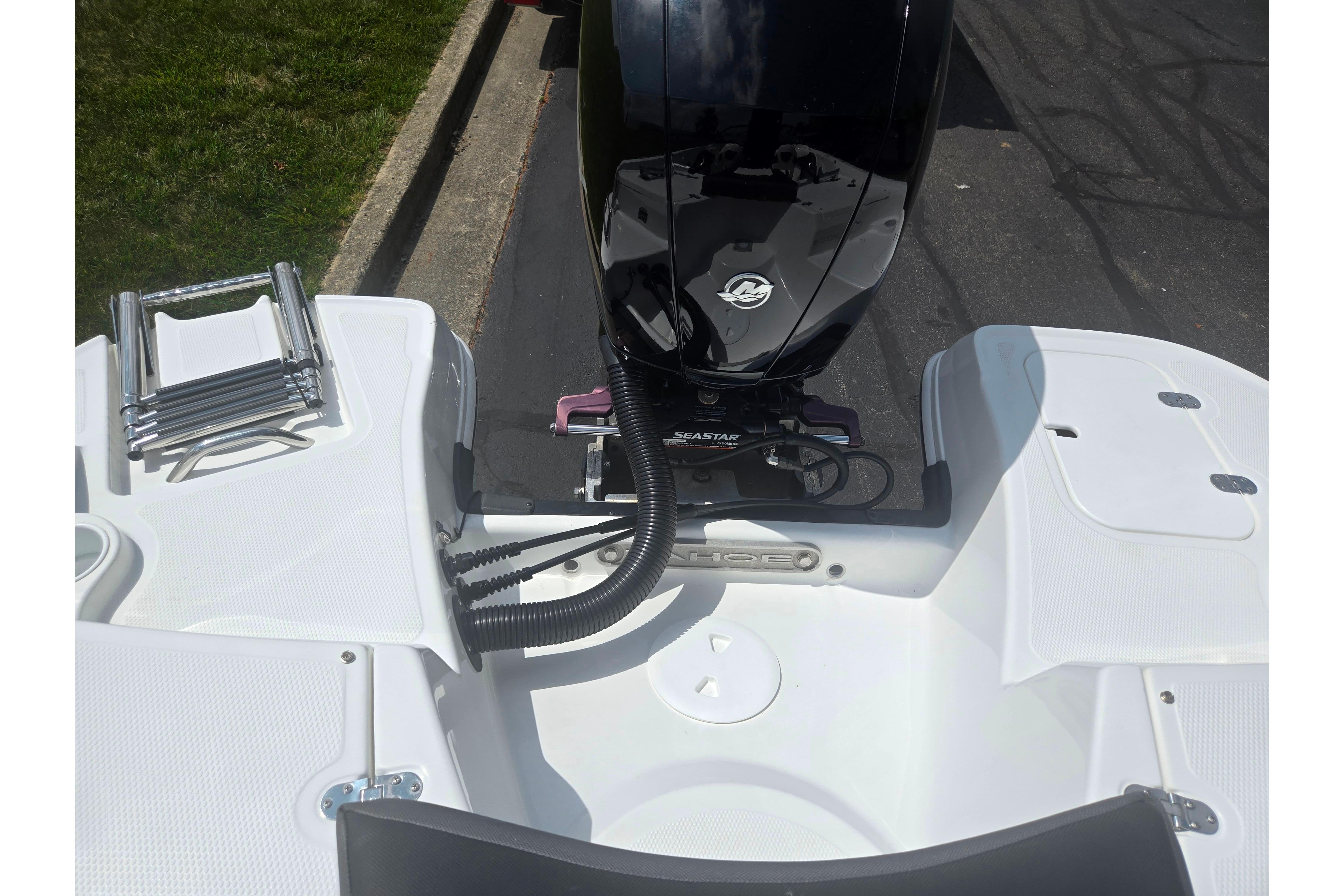 2023 Tahoe 200 S boat stern with motor and swim platform.