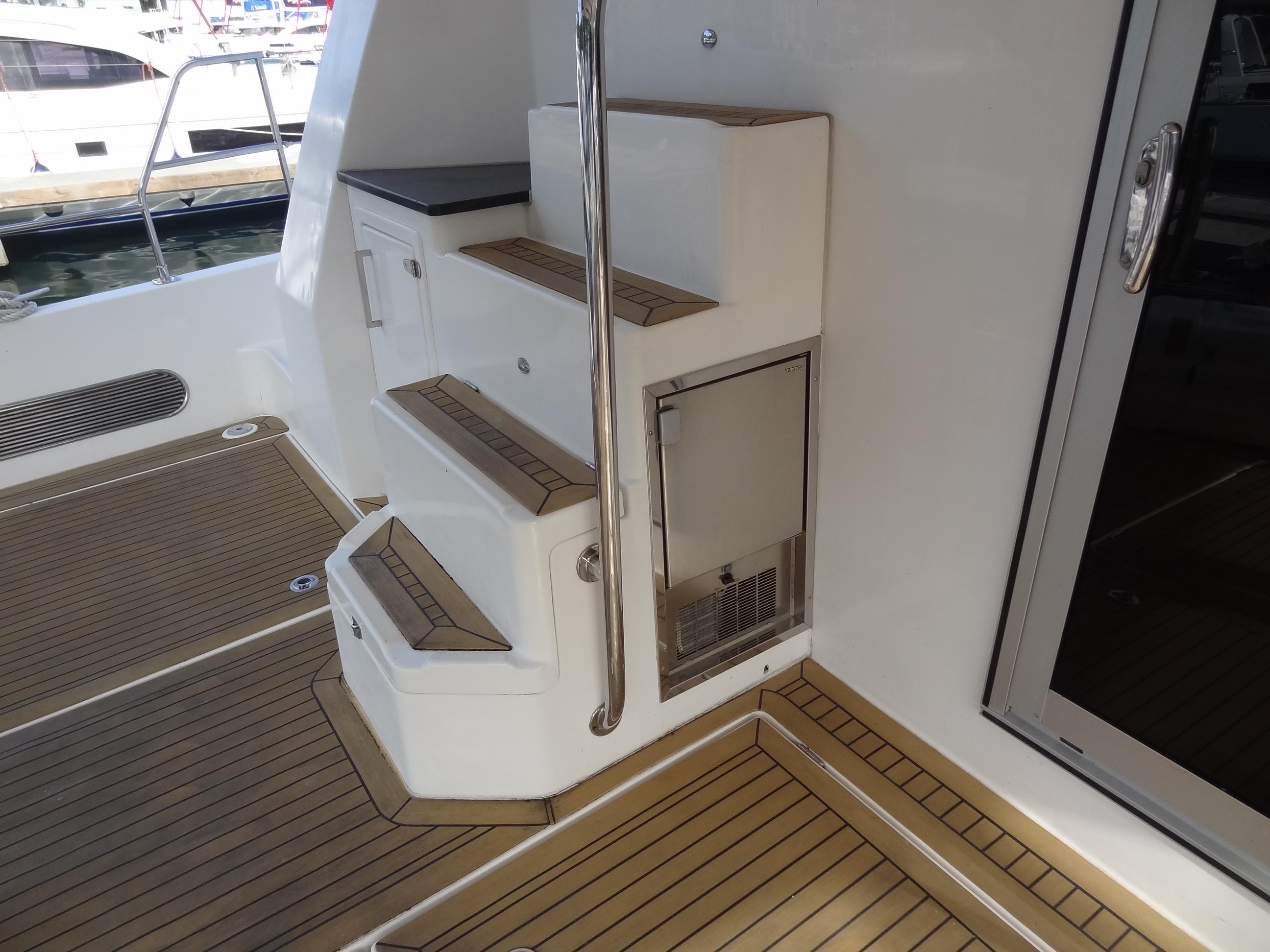 Staircase and deck area on a 2014 Leopard 58 yacht.