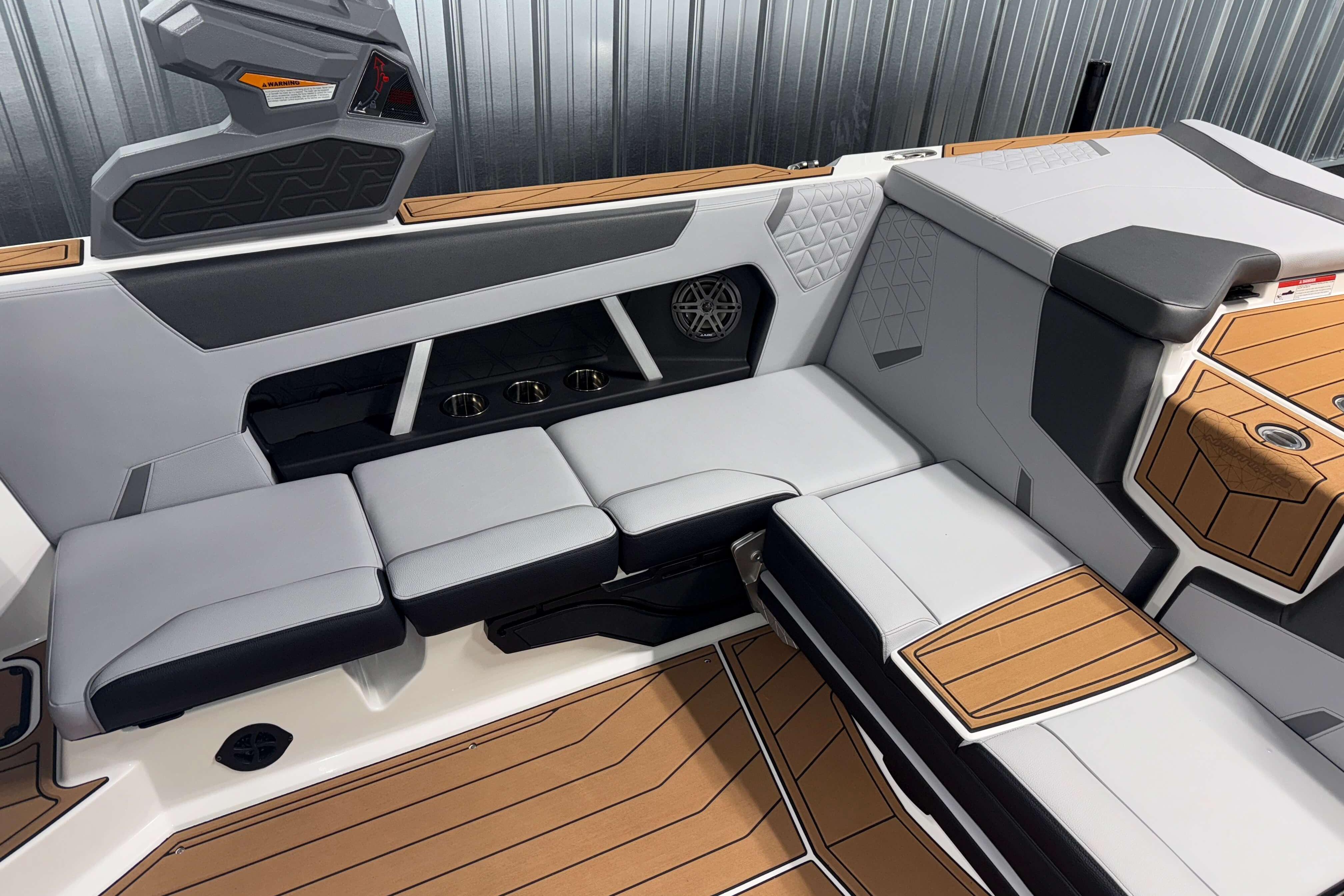 Luxurious interior of 2026 Nautique Super Air Nautique GS22 boat with modern seating design.