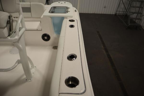 2025 Sea Fox 228 Commander boat interior with rod holders and seating.