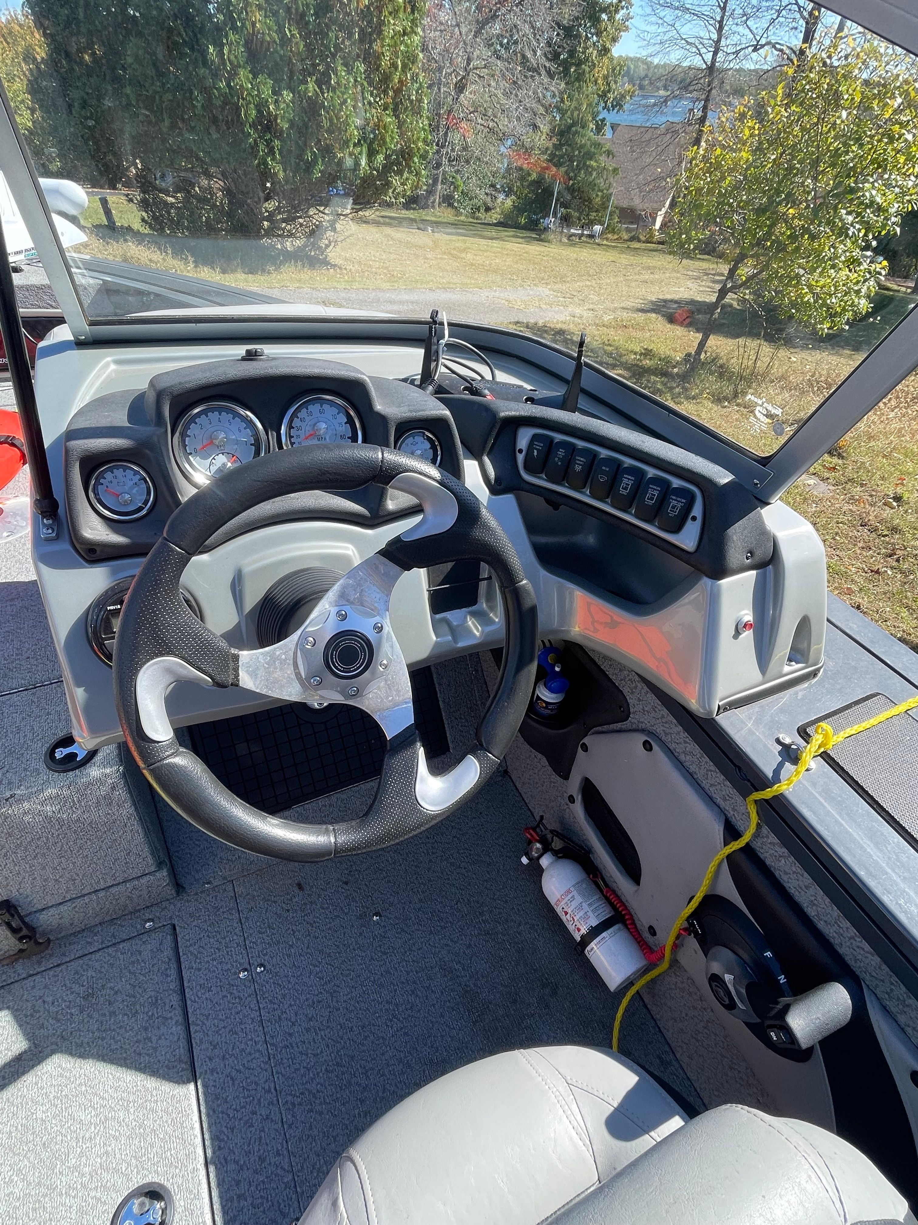 2017 Bass Tracker TARGA steering console with wheel and gauges.
