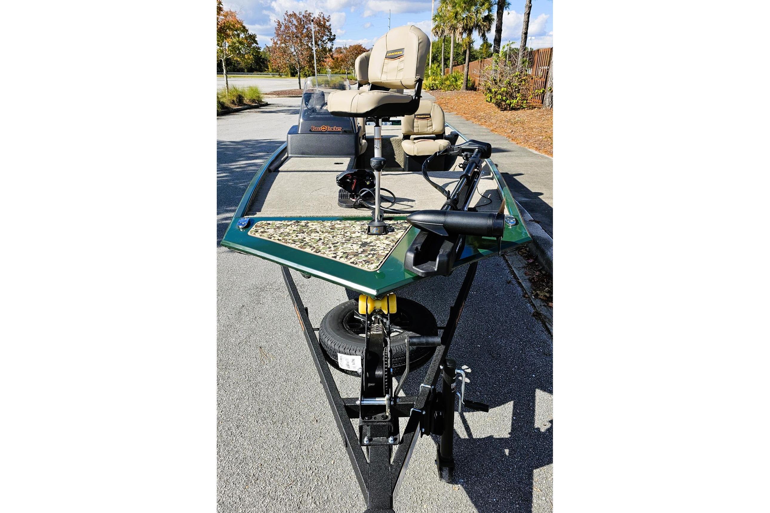 2026 Tracker Bass Tracker Classic Limited boat with seating and fishing equipment.