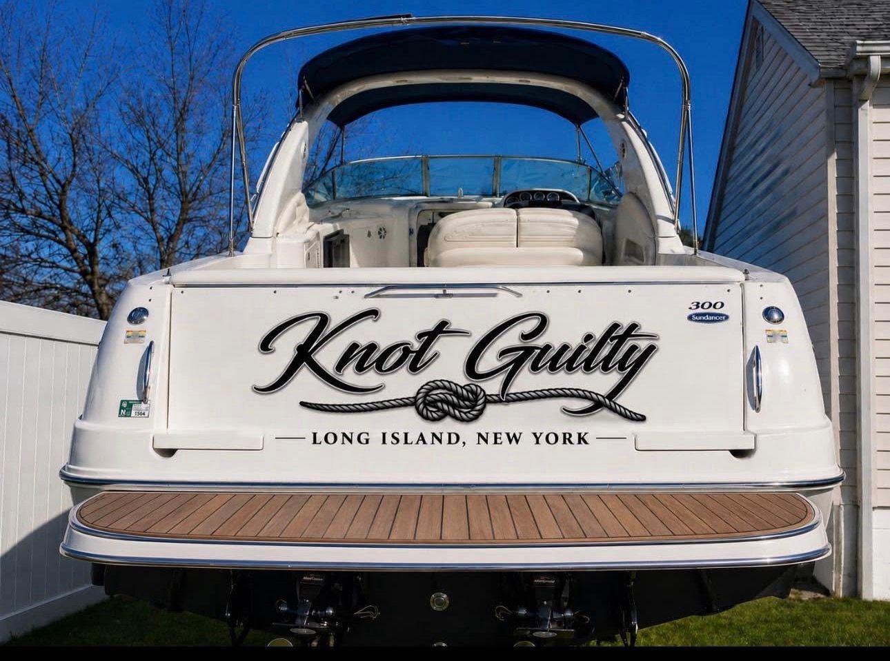 Rear view of a Sea Ray 300 Sundancer named "Knot Guilty" in Long Island.