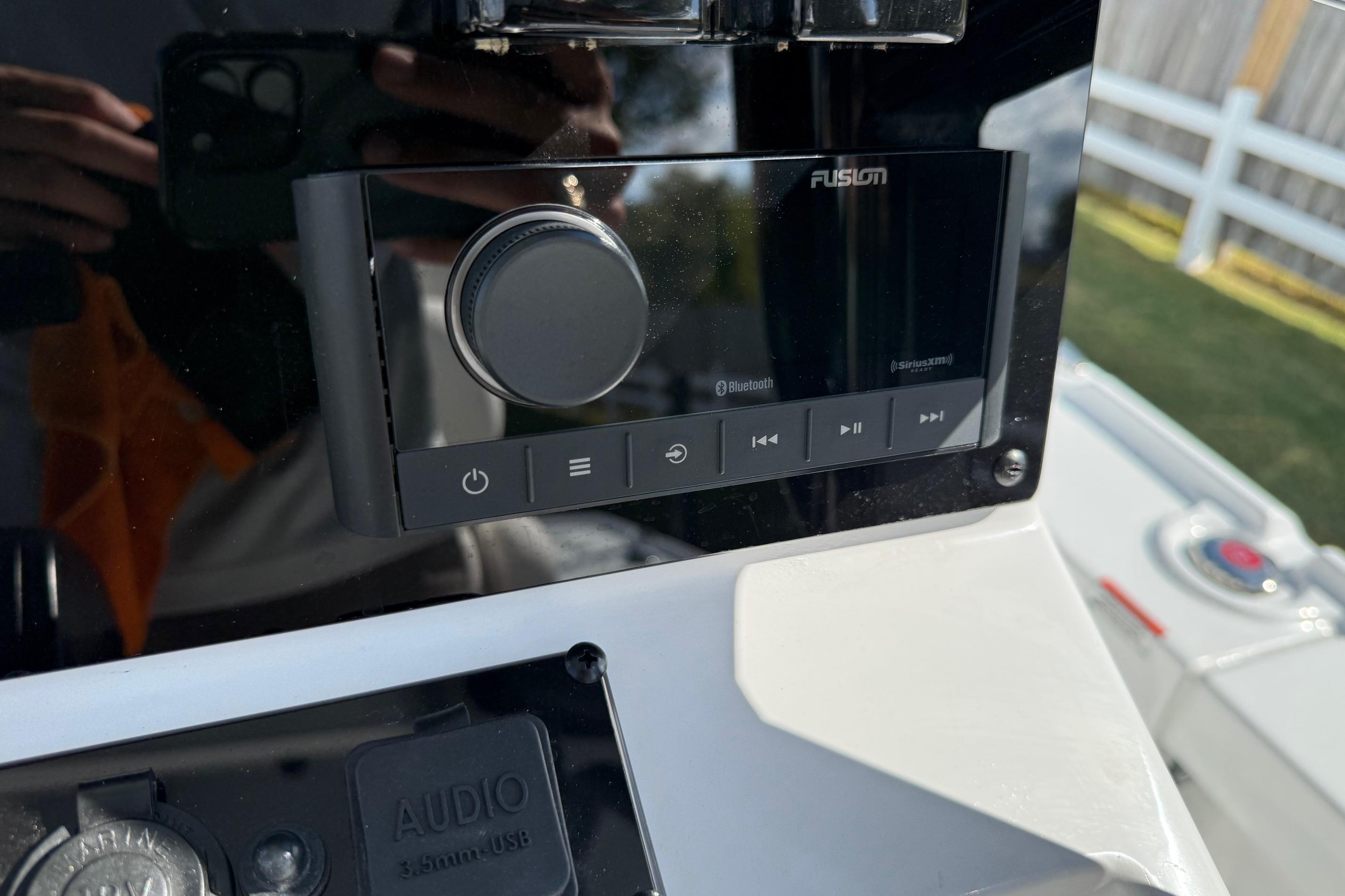 Fusion audio system on 2026 Sea Hunt BX 22 BR boat dashboard.