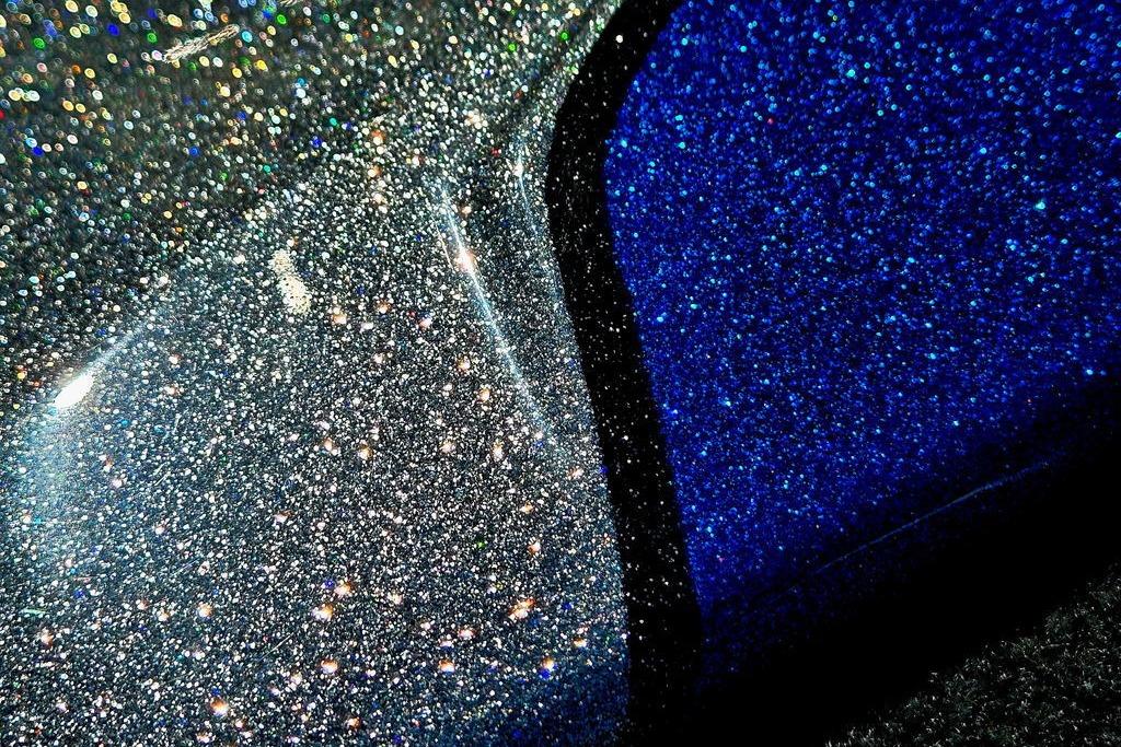 Close-up of glittering blue surface on 2026 Skeeter ZXE20 vehicle.