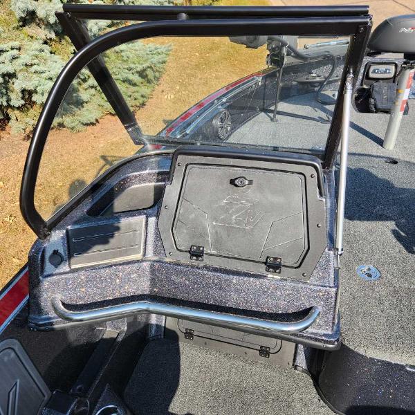 2024 Nitro ZV20 Pro boat interior with storage compartment and windshield.