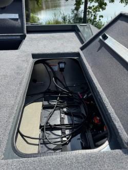 View inside storage compartment of 2025 Ranger RT198P boat.