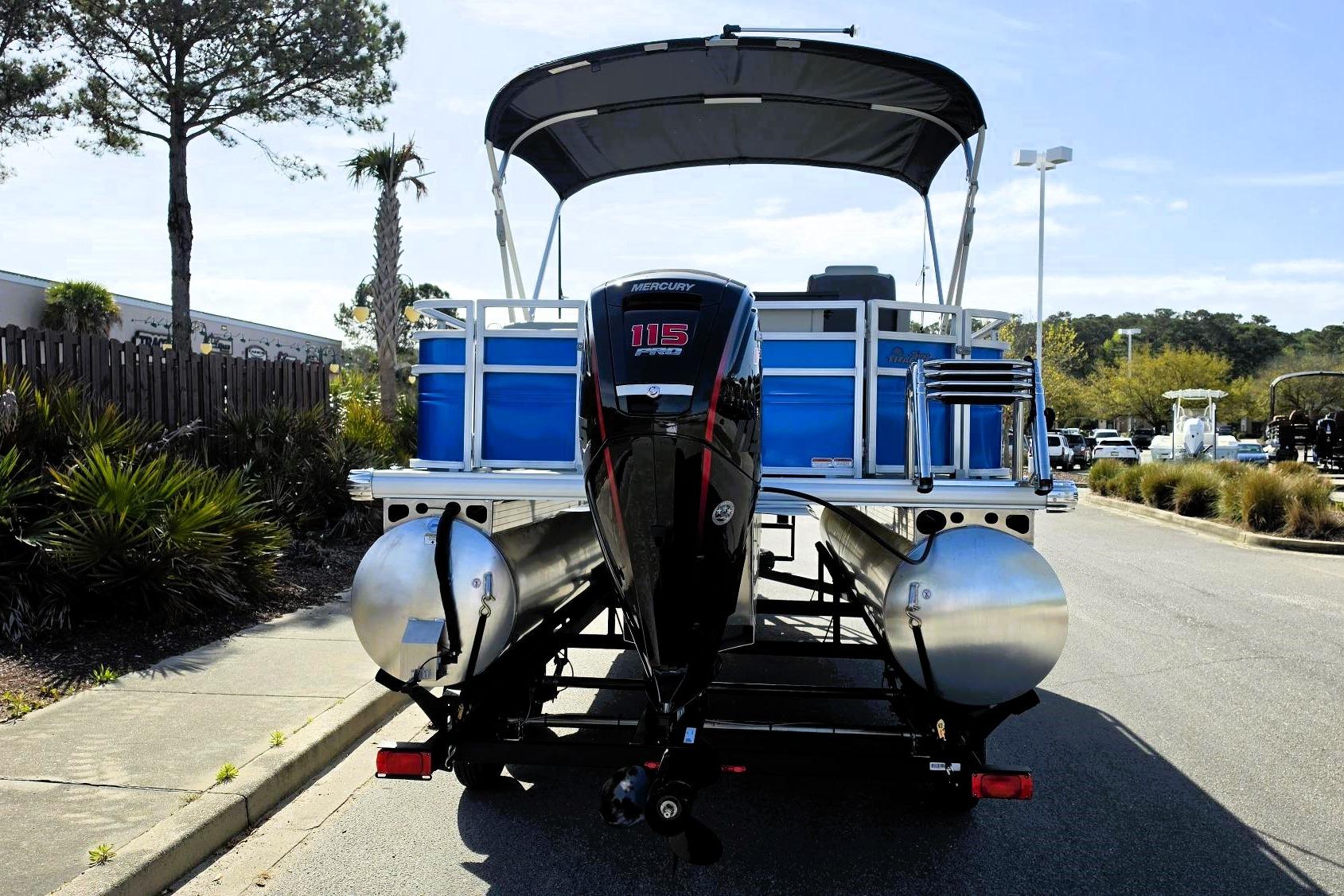 2026 Sun Tracker Fishin' Barge 20 DLX pontoon boat with Mercury 115 engine.
