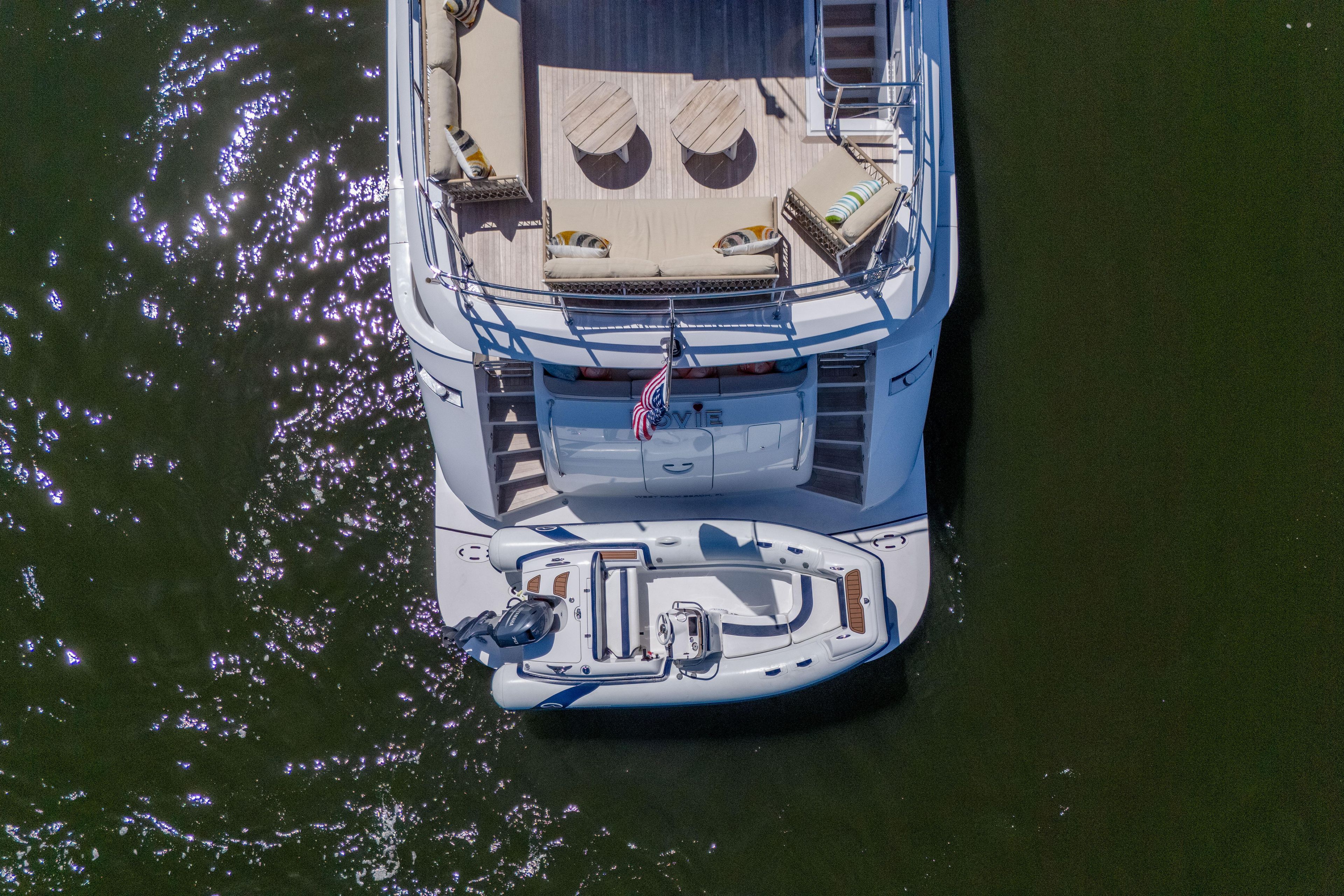Aerial view of 2021 Hatteras M75 Panacera yacht with tender boat.