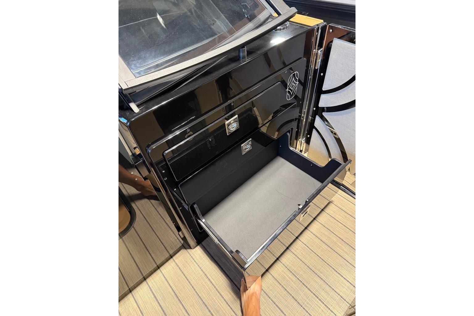 Open storage compartment in 2026 Balise Halo 26C Twin, showcasing sleek design and functionality.